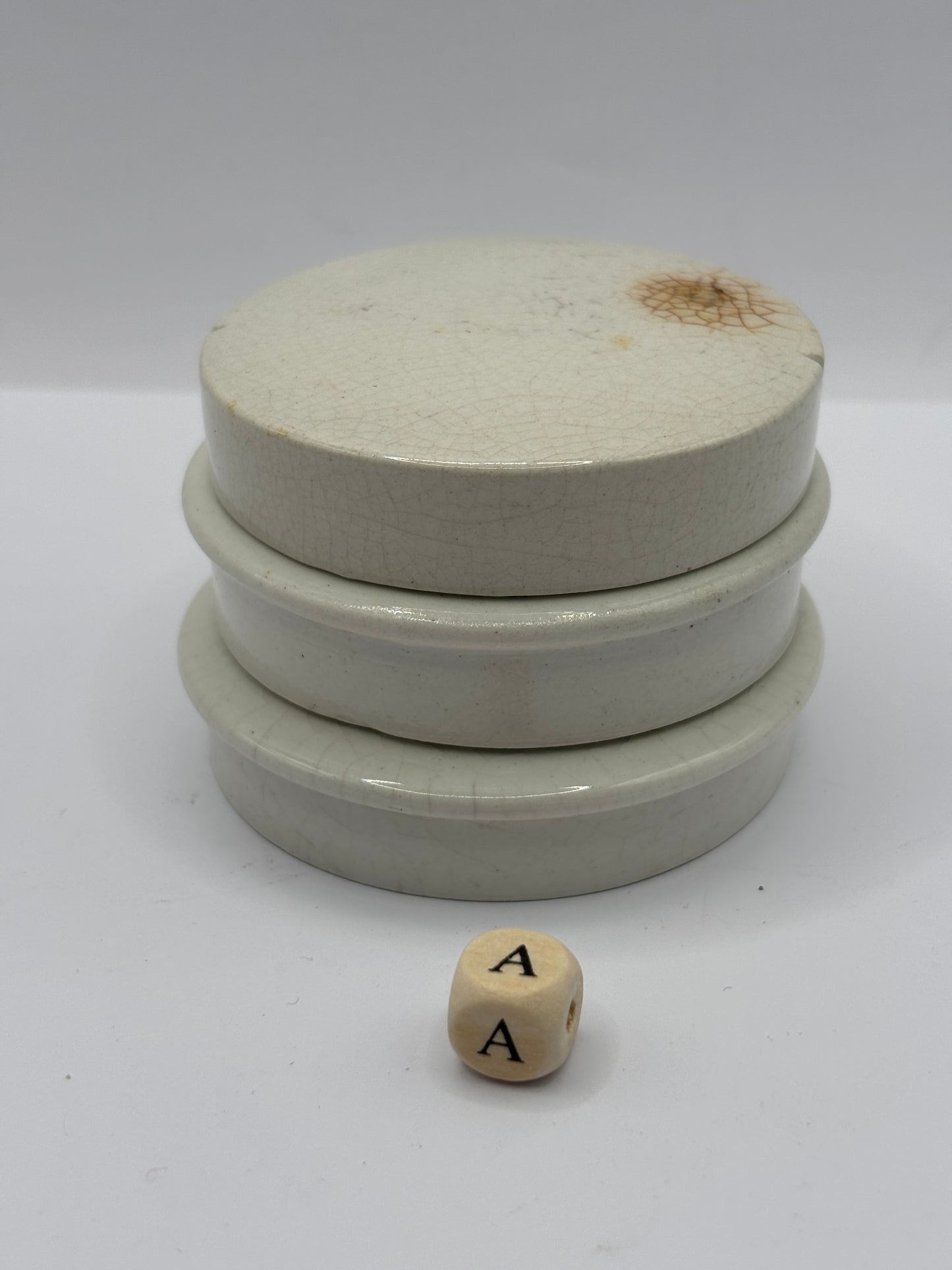 3 old plain stoneware lids (a)