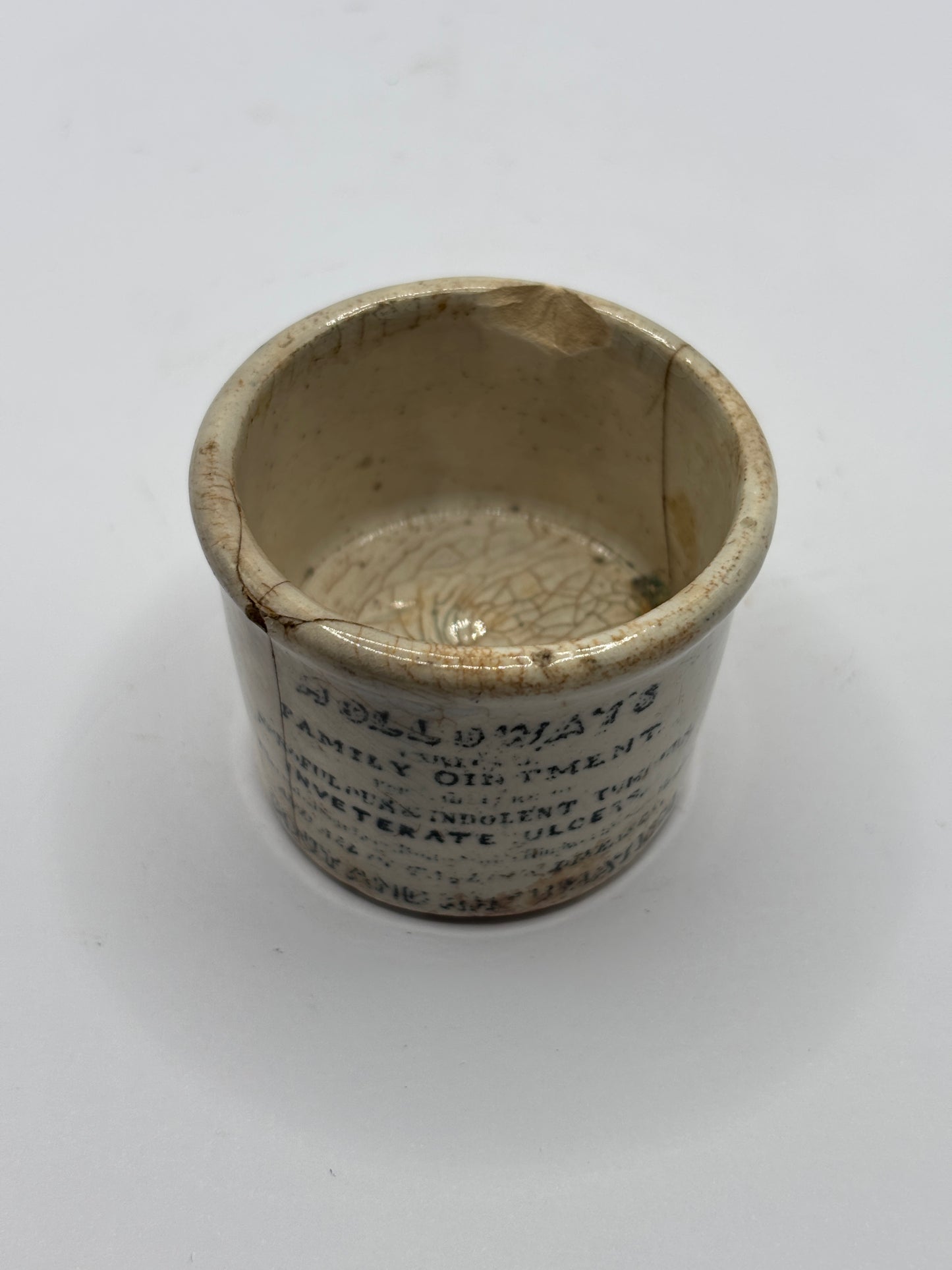 Old early Holloways advertising ointment pot