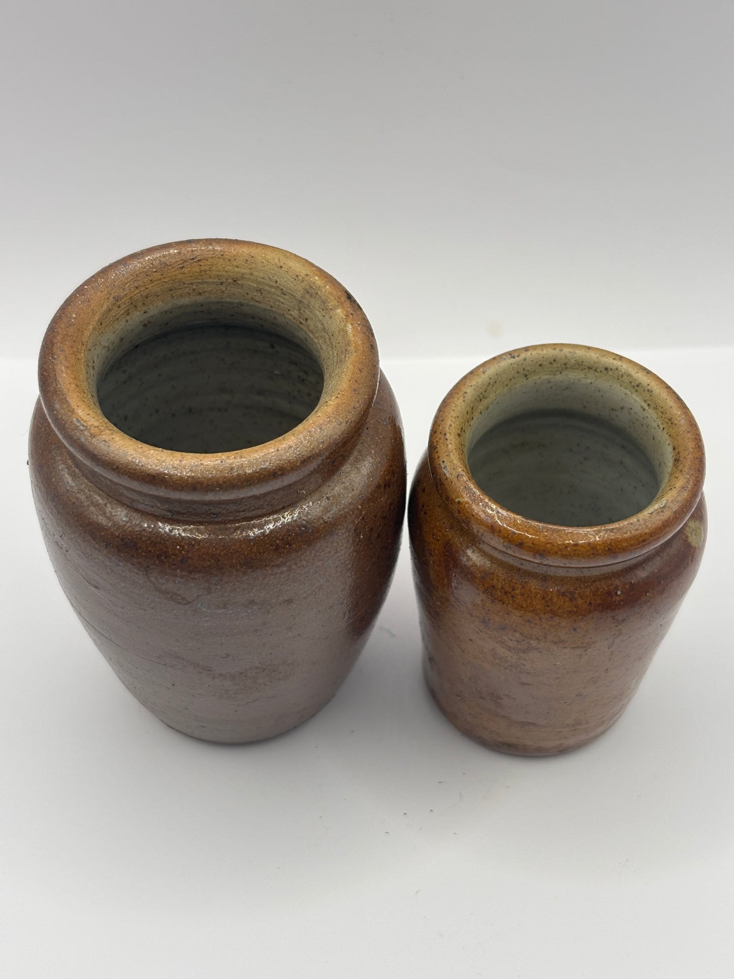 2 Old brown stoneware cream pots
