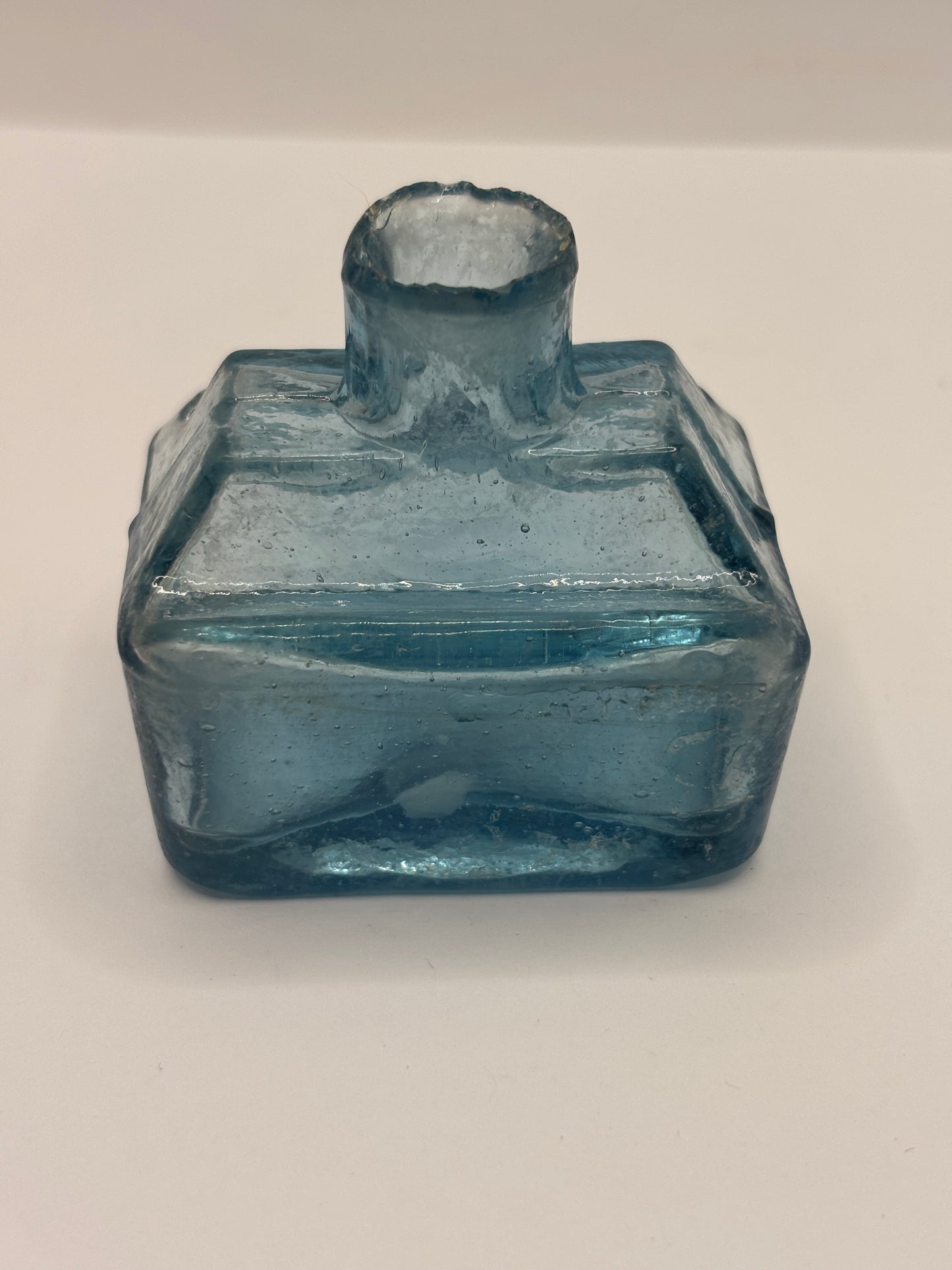 Old blue glass inkwell, ink bottle, penny ink. Boat ink