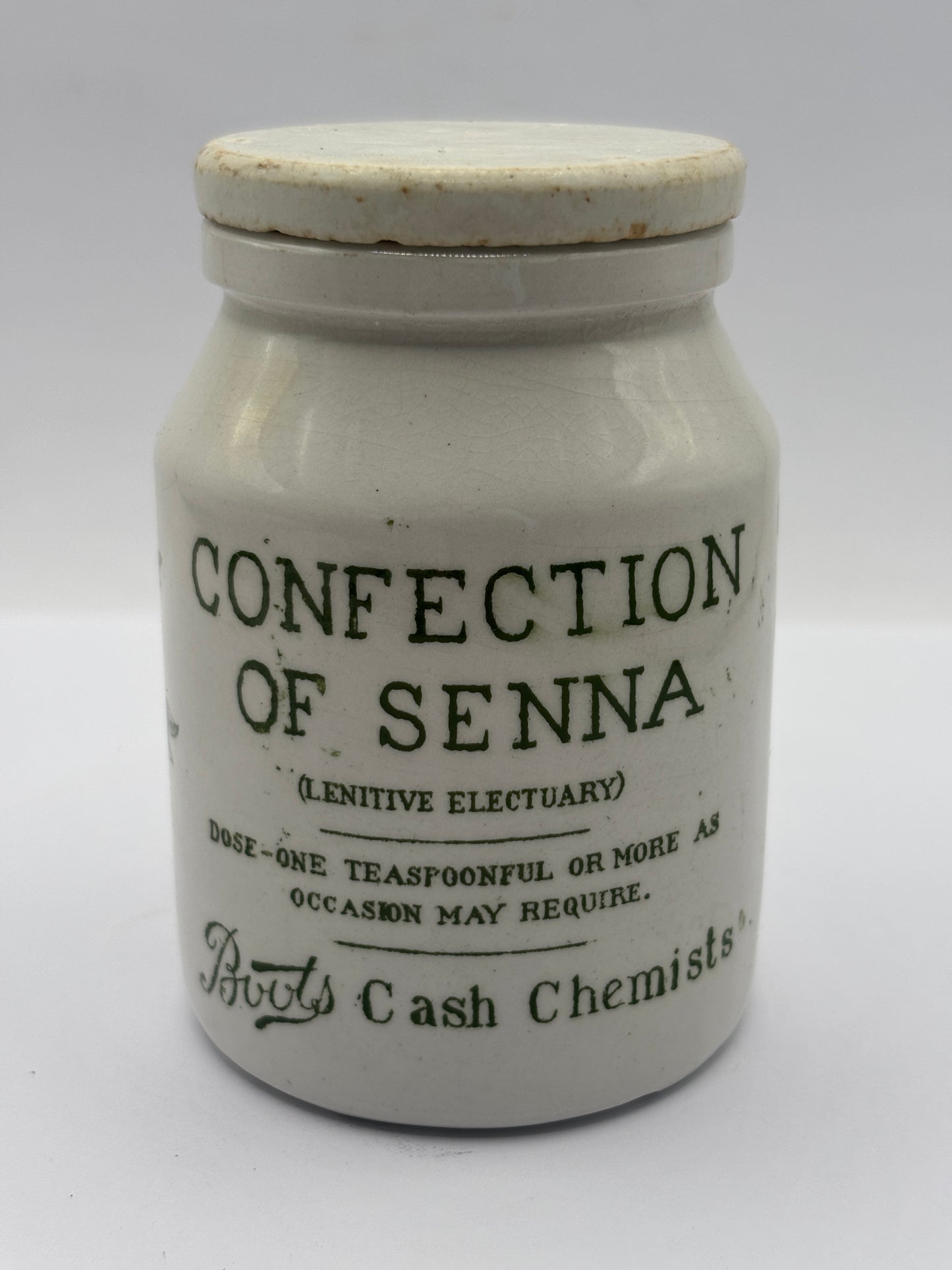 Old stoneware advertising jar and lid, Boots confection of senna