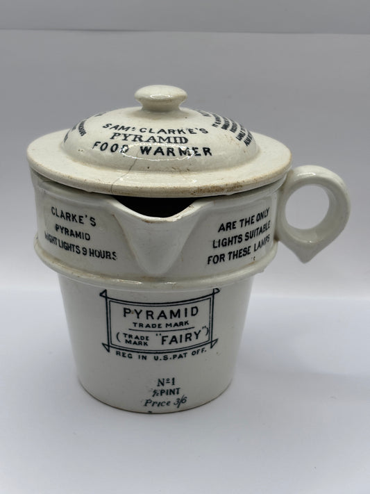 Old stoneware advertising food warmer. Clarkes Pyramid food warmer. Damaged/repaired