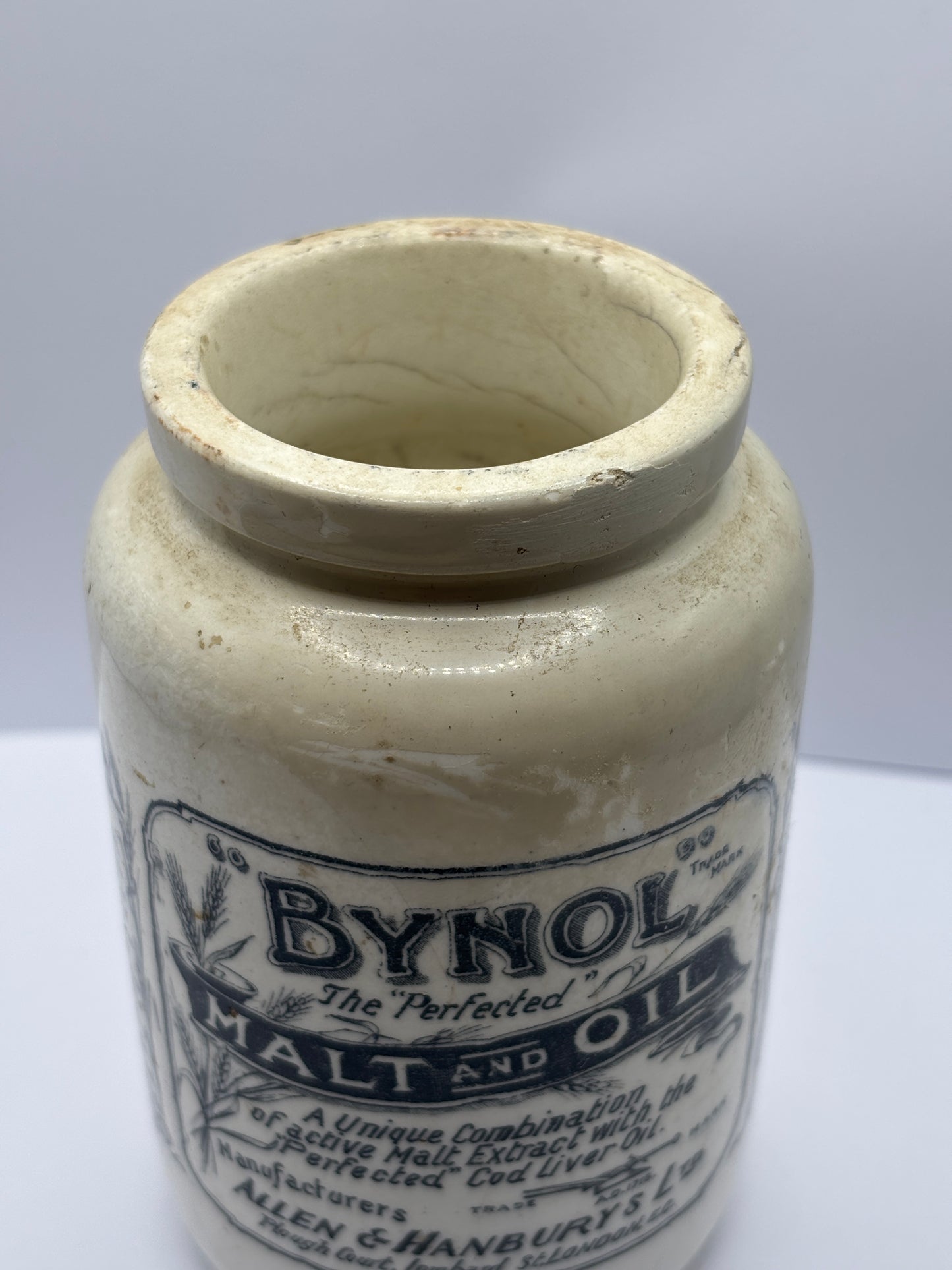 Old Bynol advertising pot, repaired & damaged