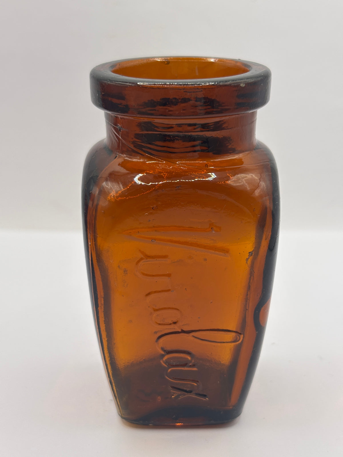 Old amber glass Virolax jar