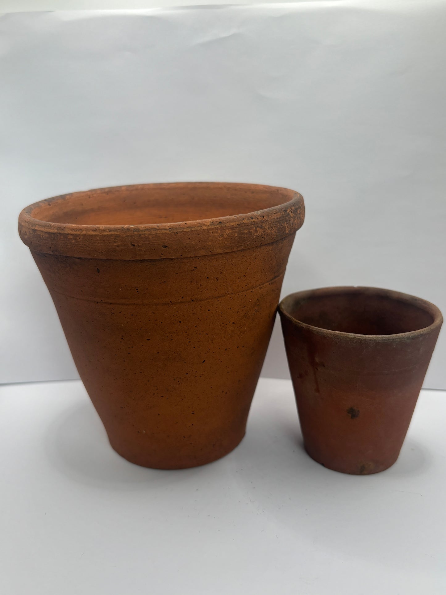 2 old terracotta plant pots