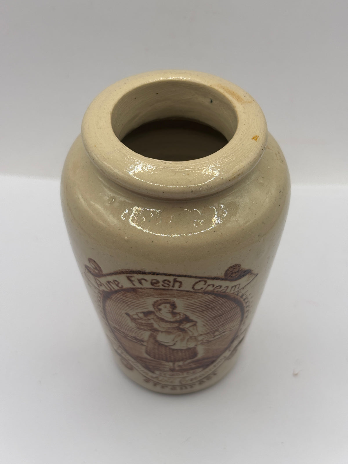 Old advertising cream pot, rich preserved cream stranraer, milkmaid. Serpia print
