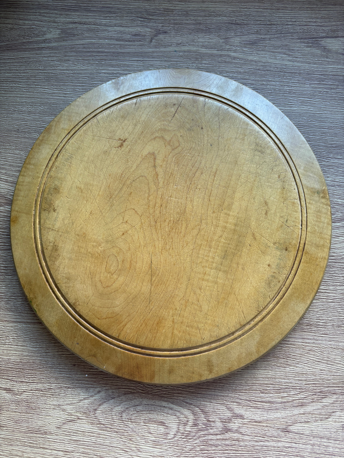 Old wooden carved bread board