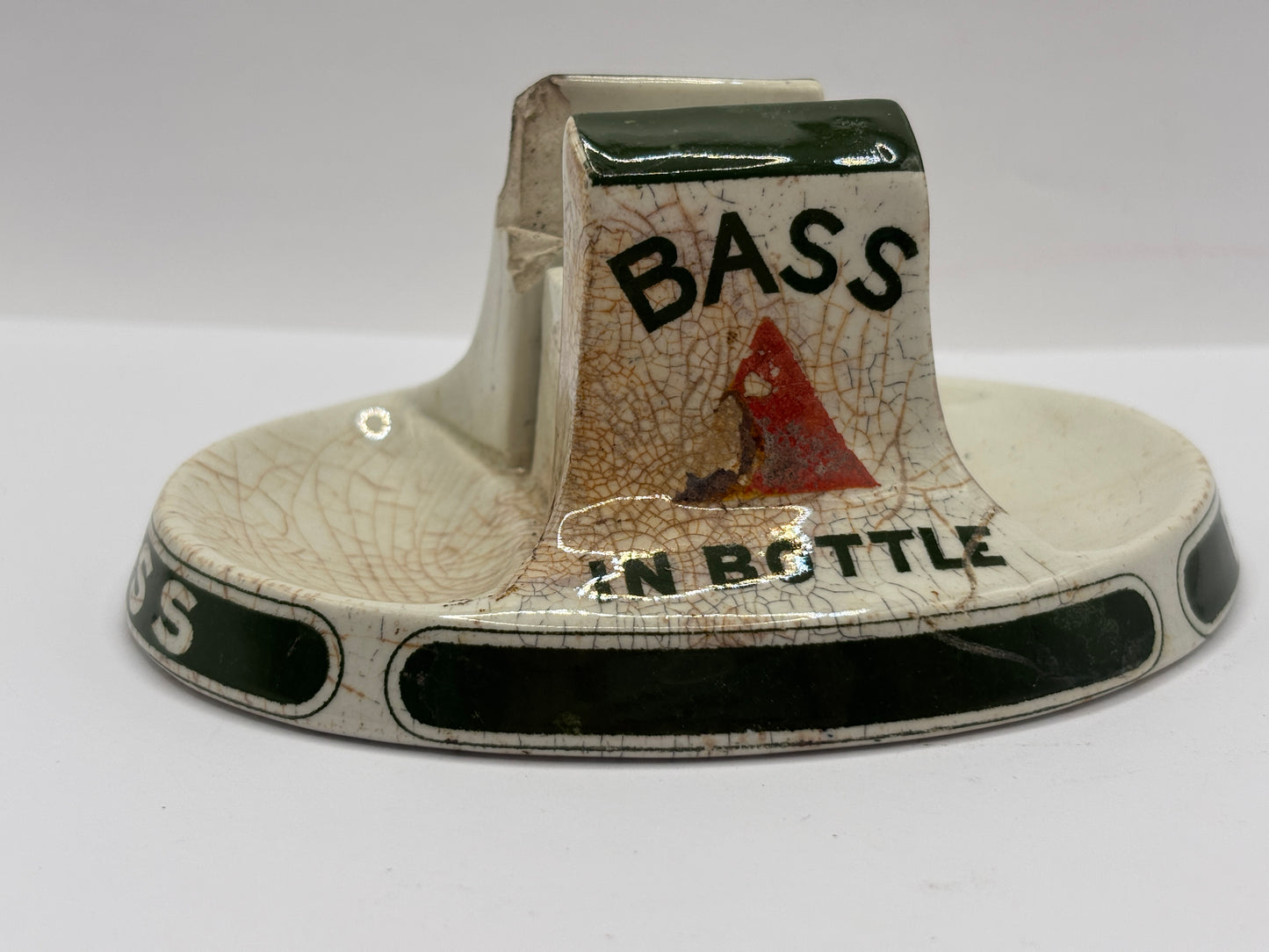 Old stoneware match striker. Bass bottled beer. Damages