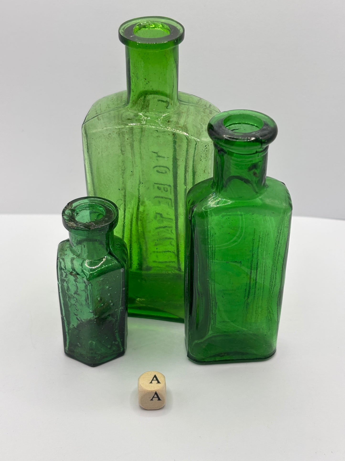 3 old green poison bottles, not to be taken