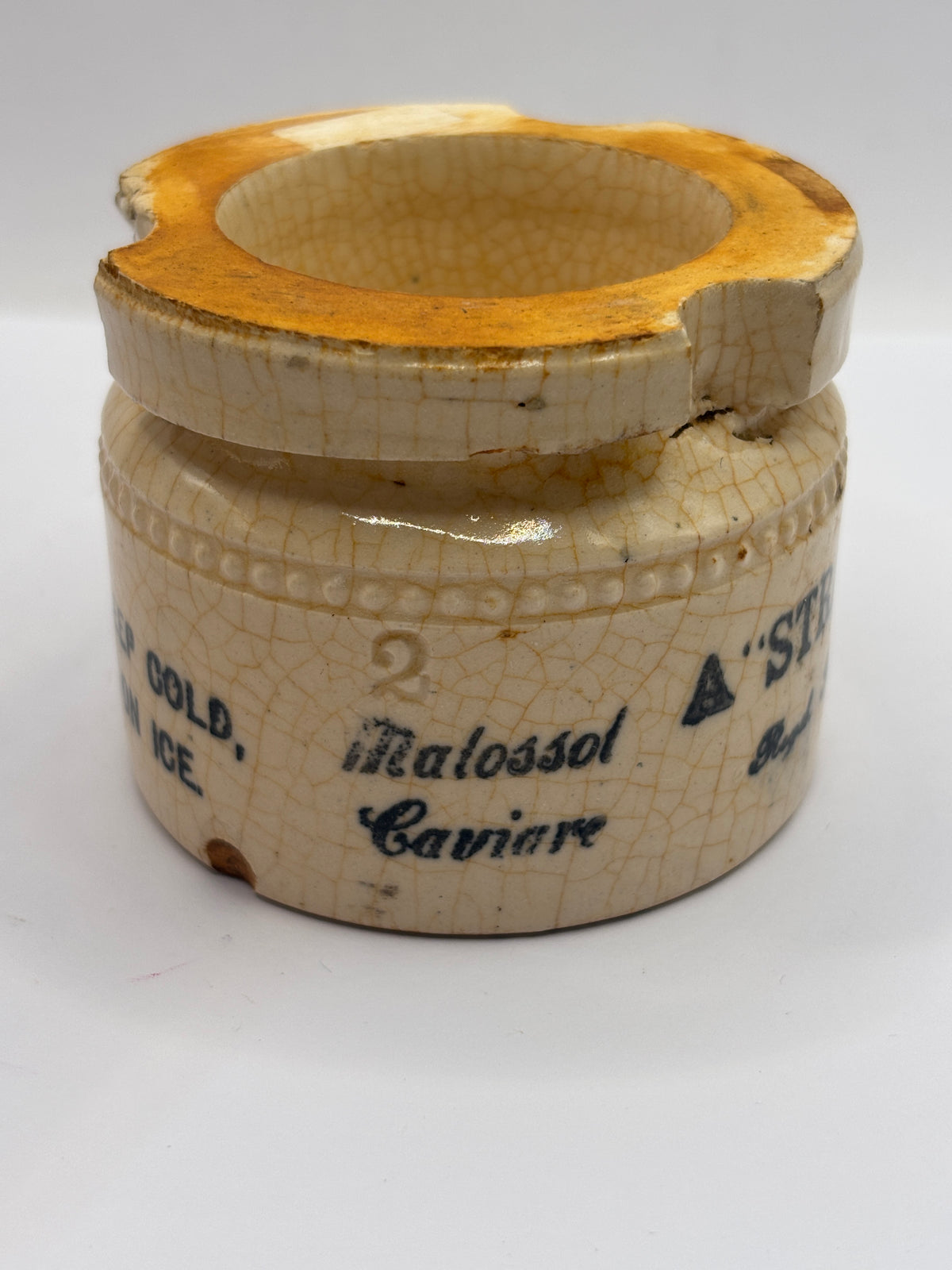 Old stoneware advertising jar, Malossol Caviare