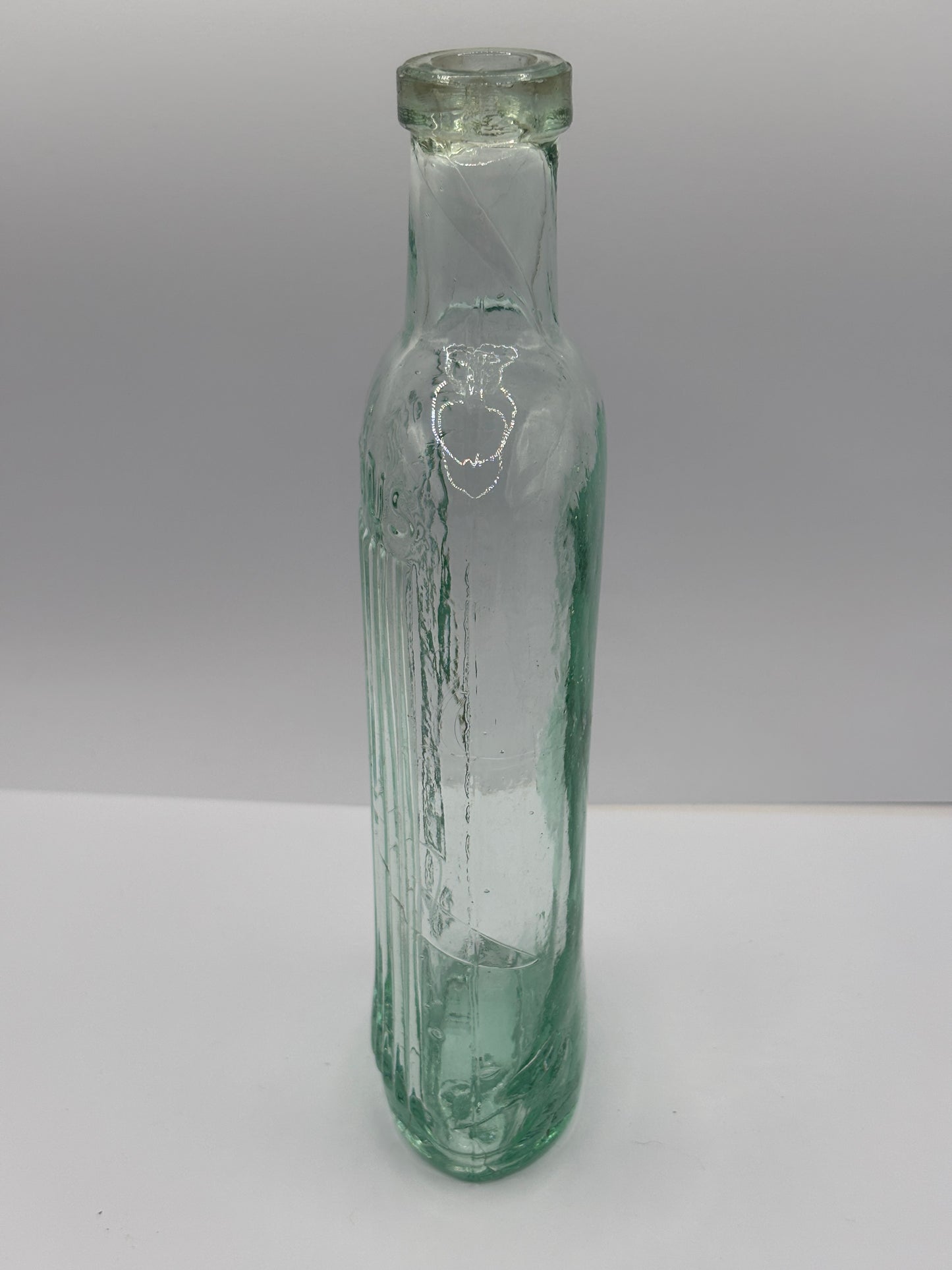 Old aqua glass poison bottle, Poisonous