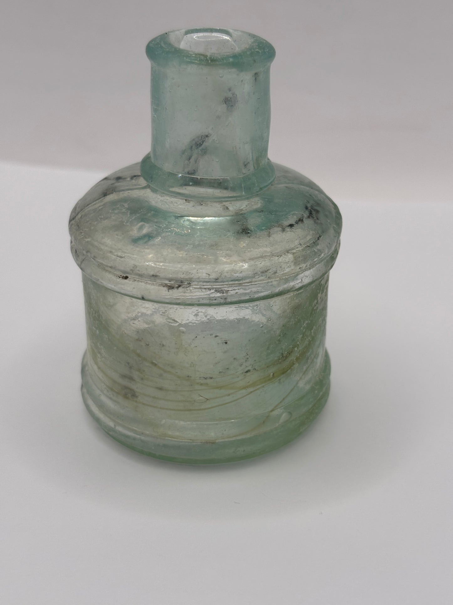 Old advertising inkwell,ink bottle. Lyons ink. Swirly