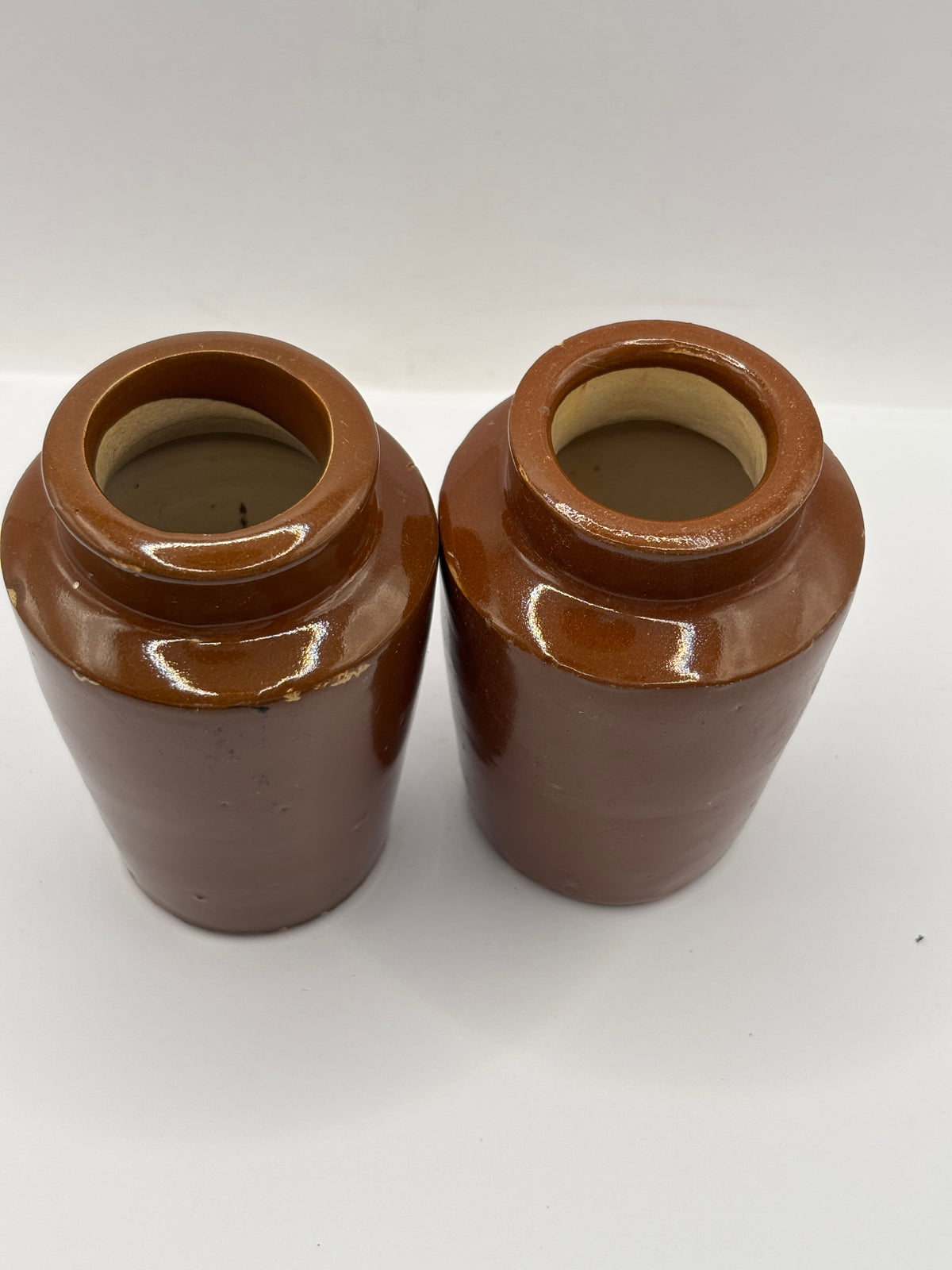2 Old brown stoneware cream pots
