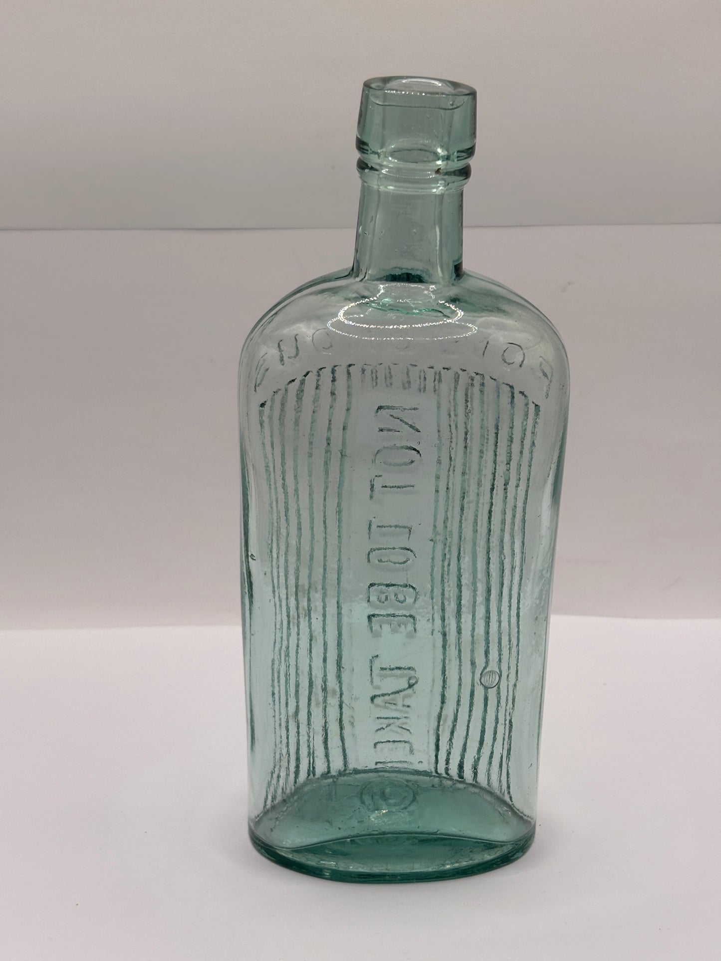 Old aqua glass poison bottle, Poisonous not to be taken