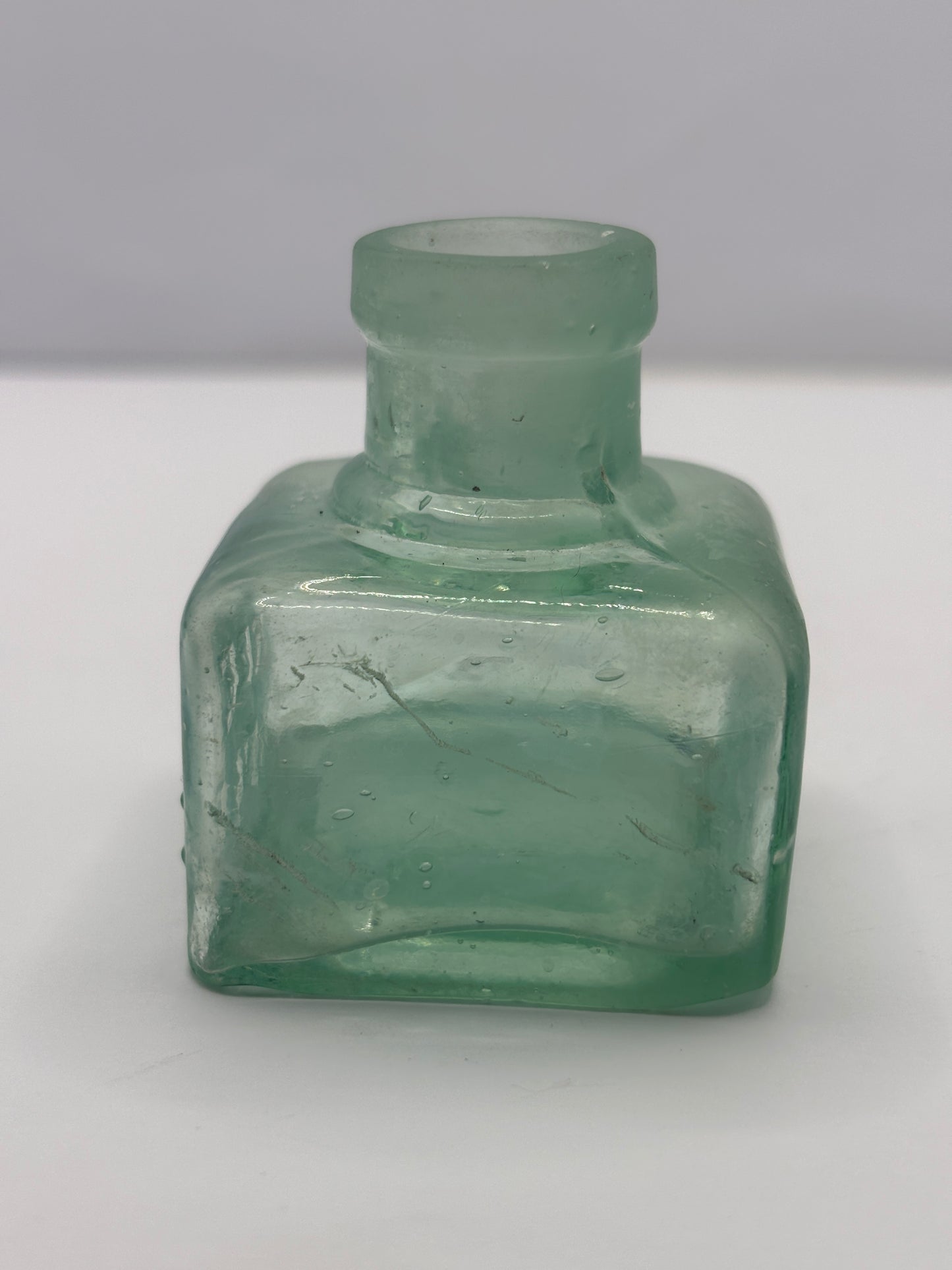 Old free sample inkwell, ink bottle