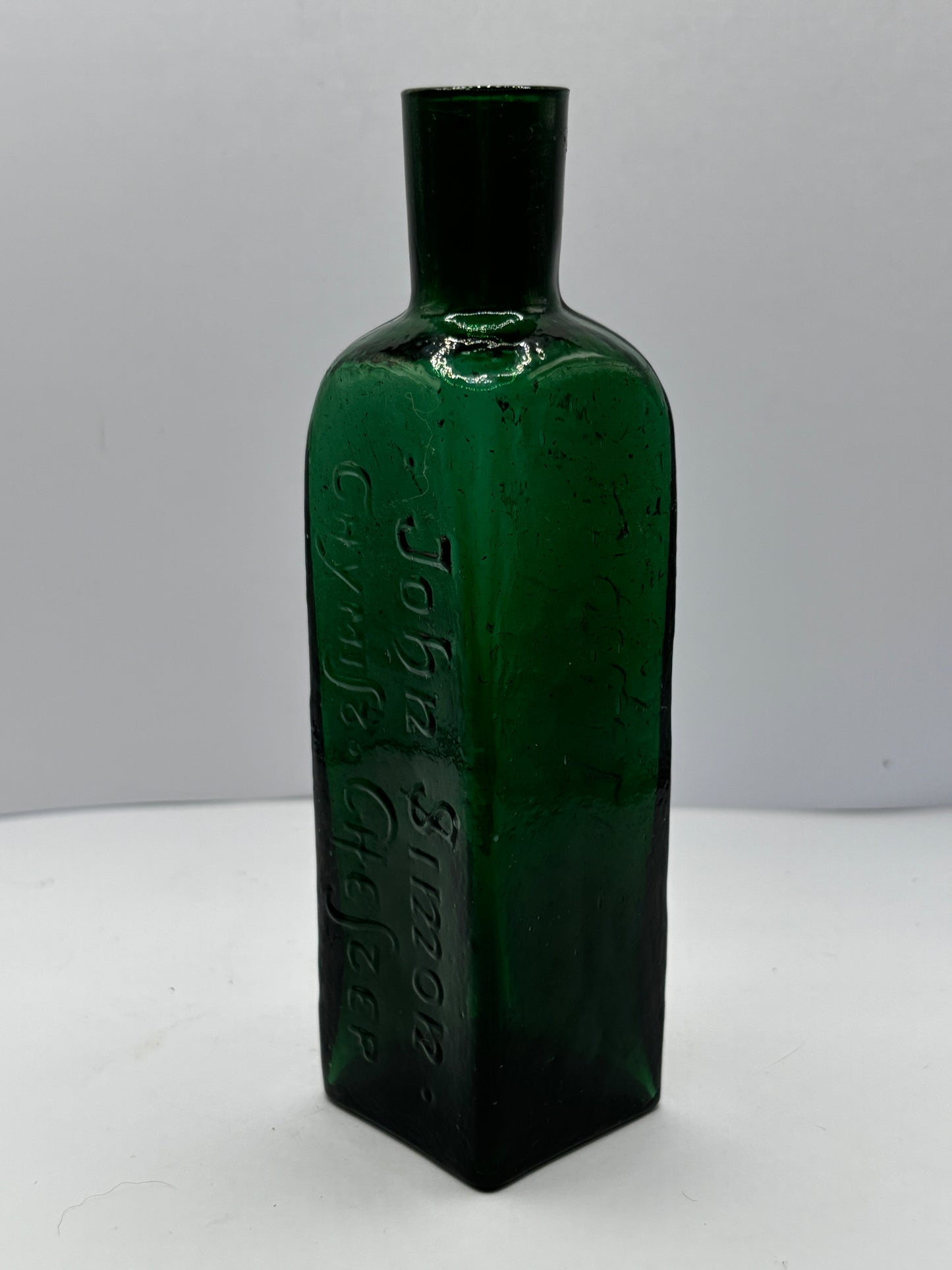 Old green advertising lavender water bottle, Ye far famed olde english lavender water