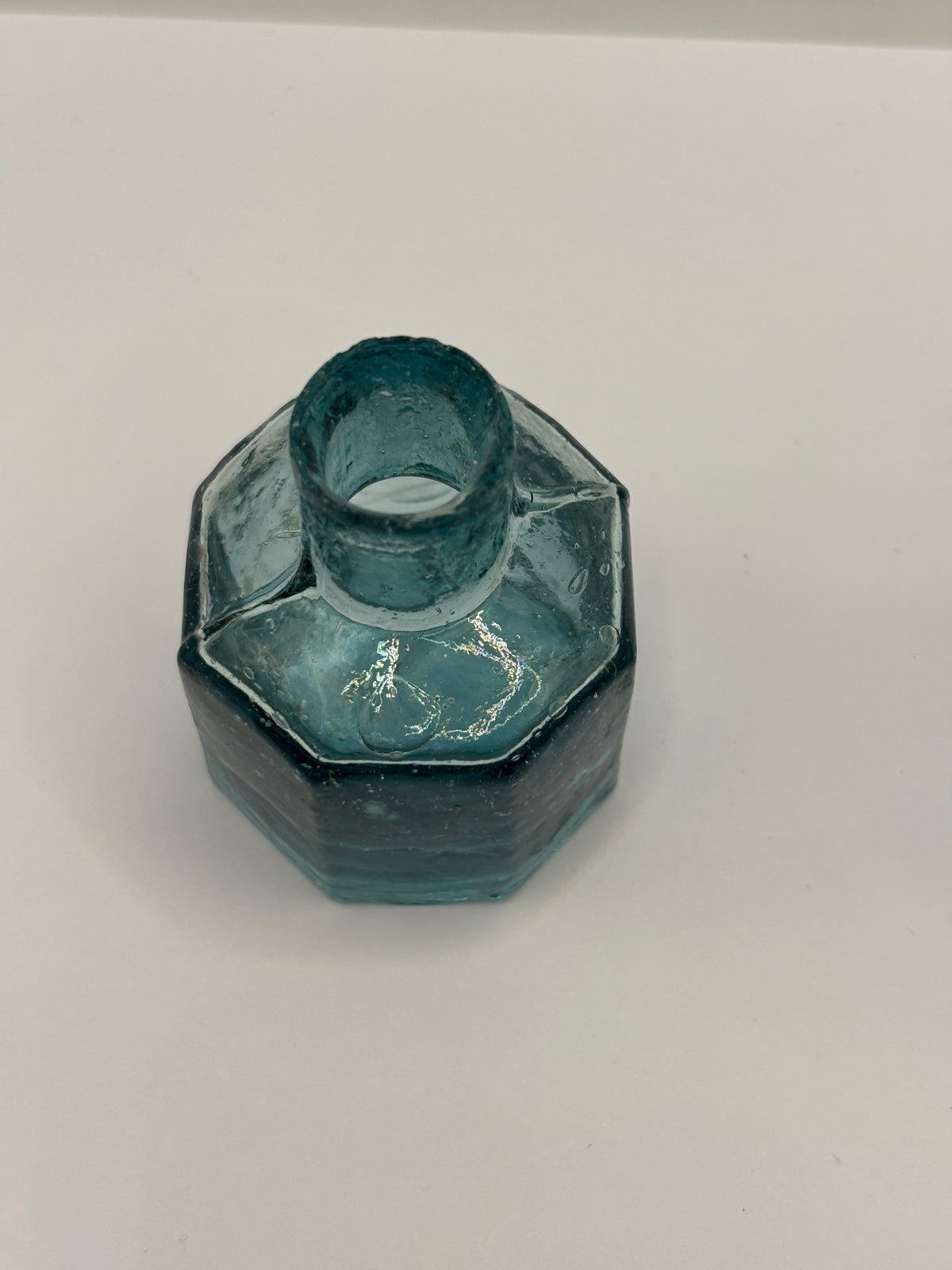 Old blue glass inkwell, ink bottle, penny ink with swirls