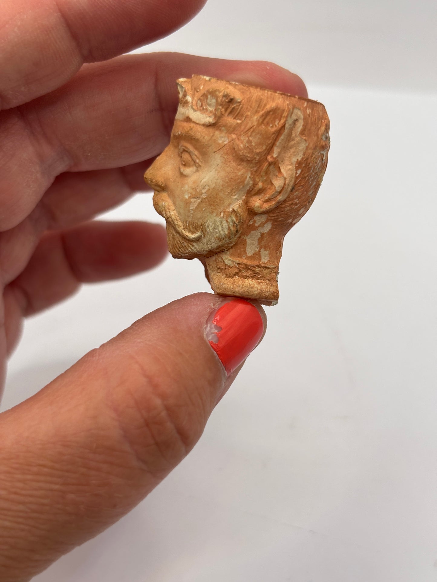 Old figural clay pipe head, pipe bowl