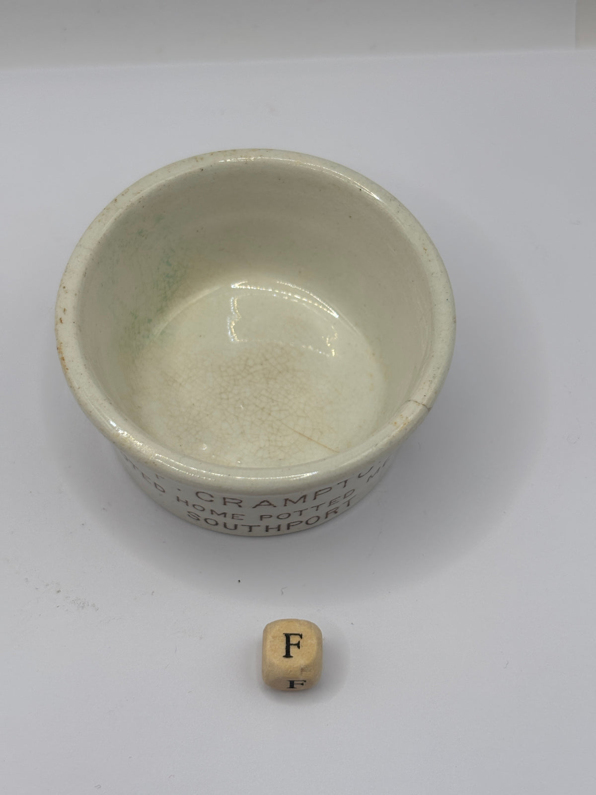 Old small advertising meat paste pot, Cramptons noted home potted meats