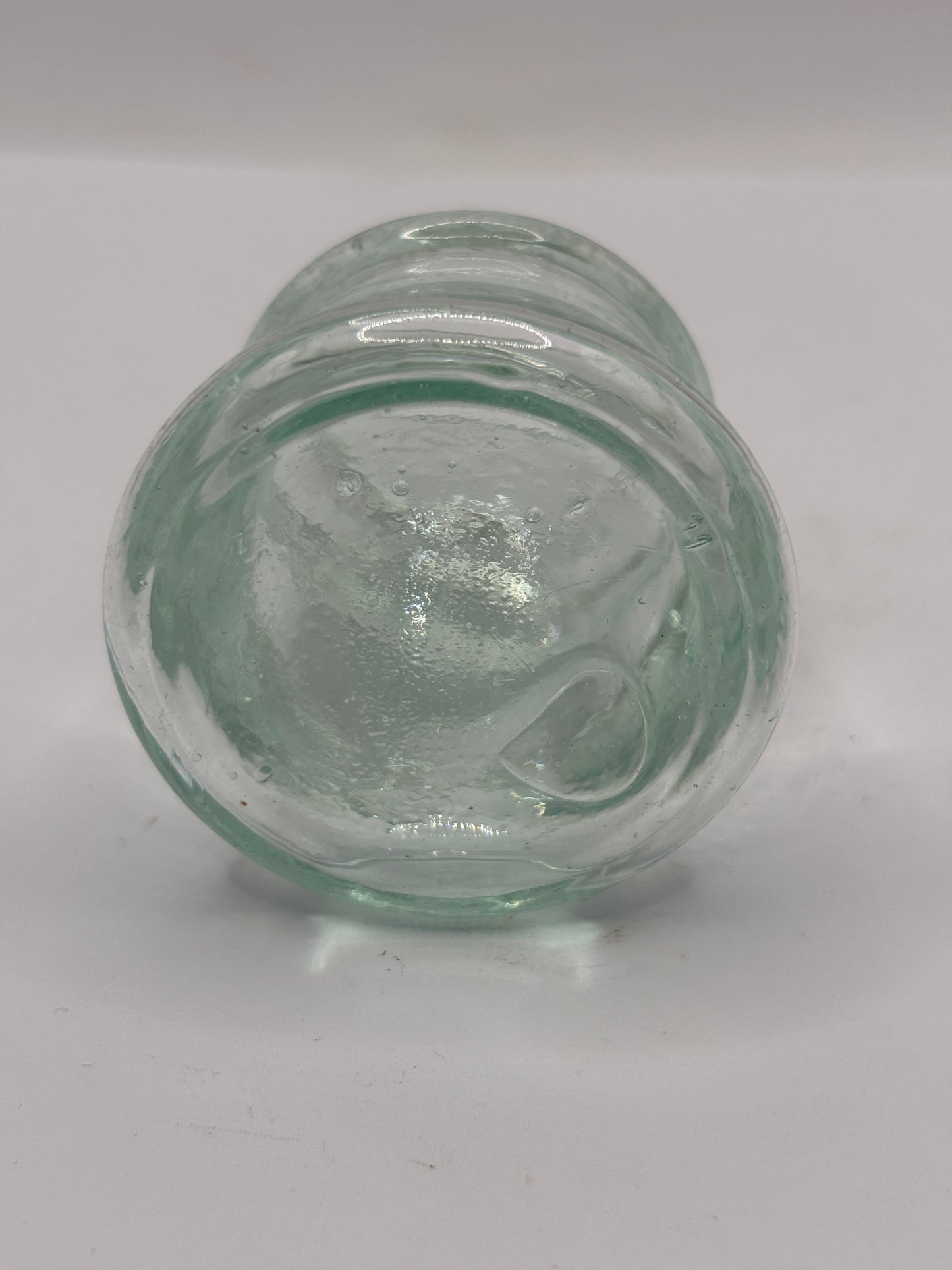 Old aqua glass inkwell. Ink bottle