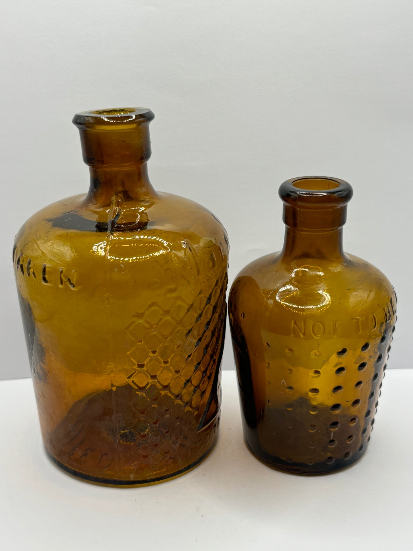 2 amber glass lysol bottles