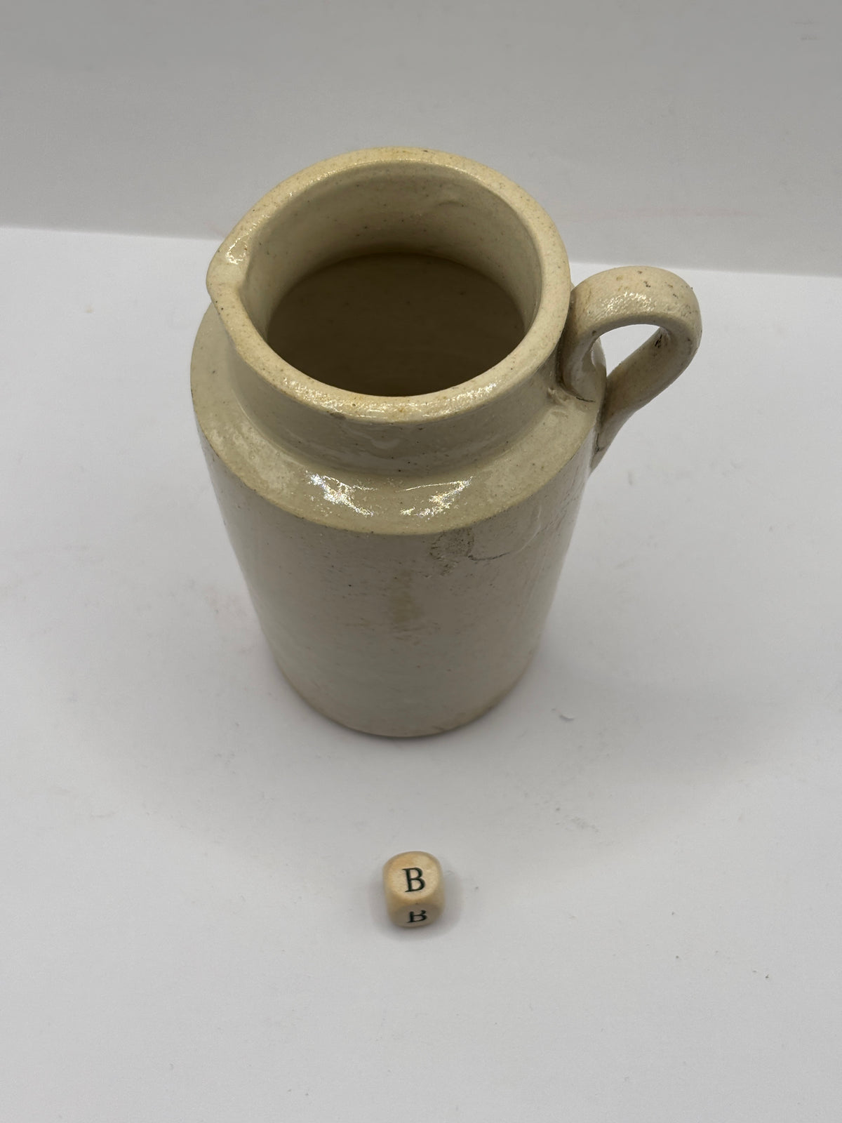 Old white stoneware cream jug (B)