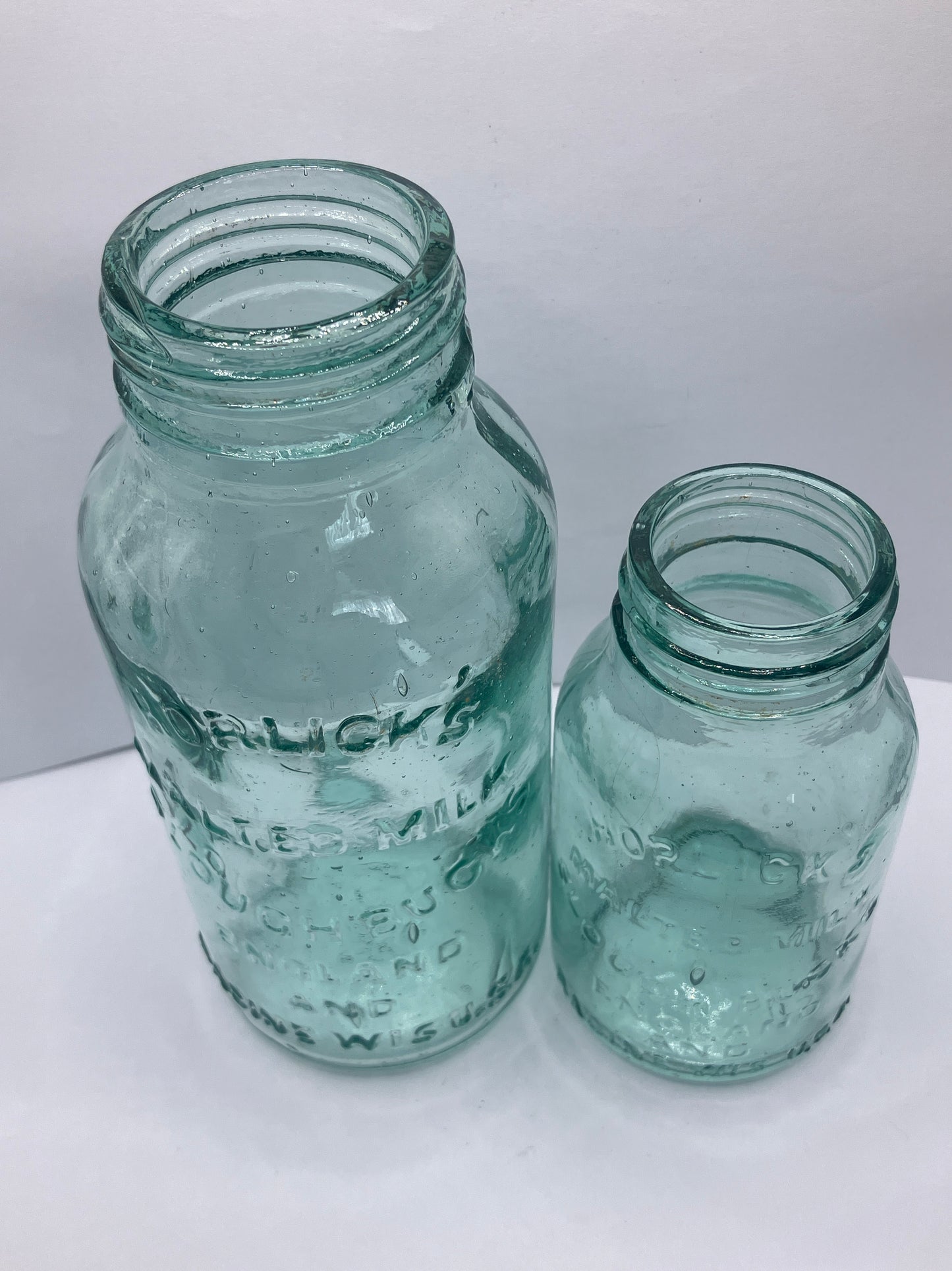 2 aqua glass advertising Horlicks  malted milk jars