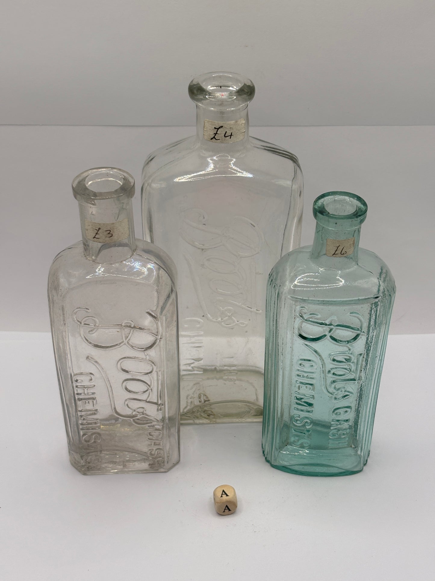 3 Old glass Boots cash chemists bottles (A)