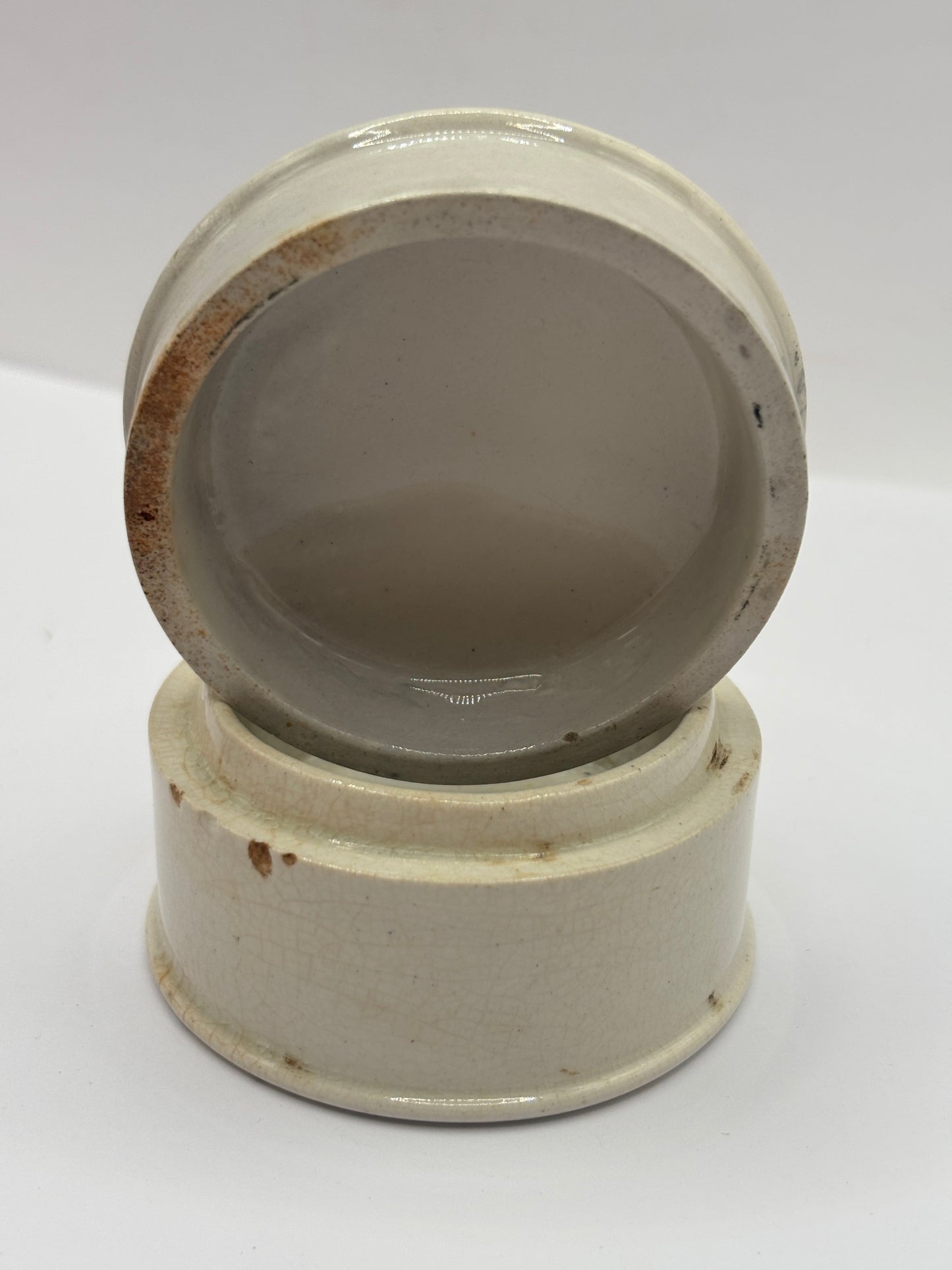 Old advertising lid and base. Woods areca nut tooth paste
