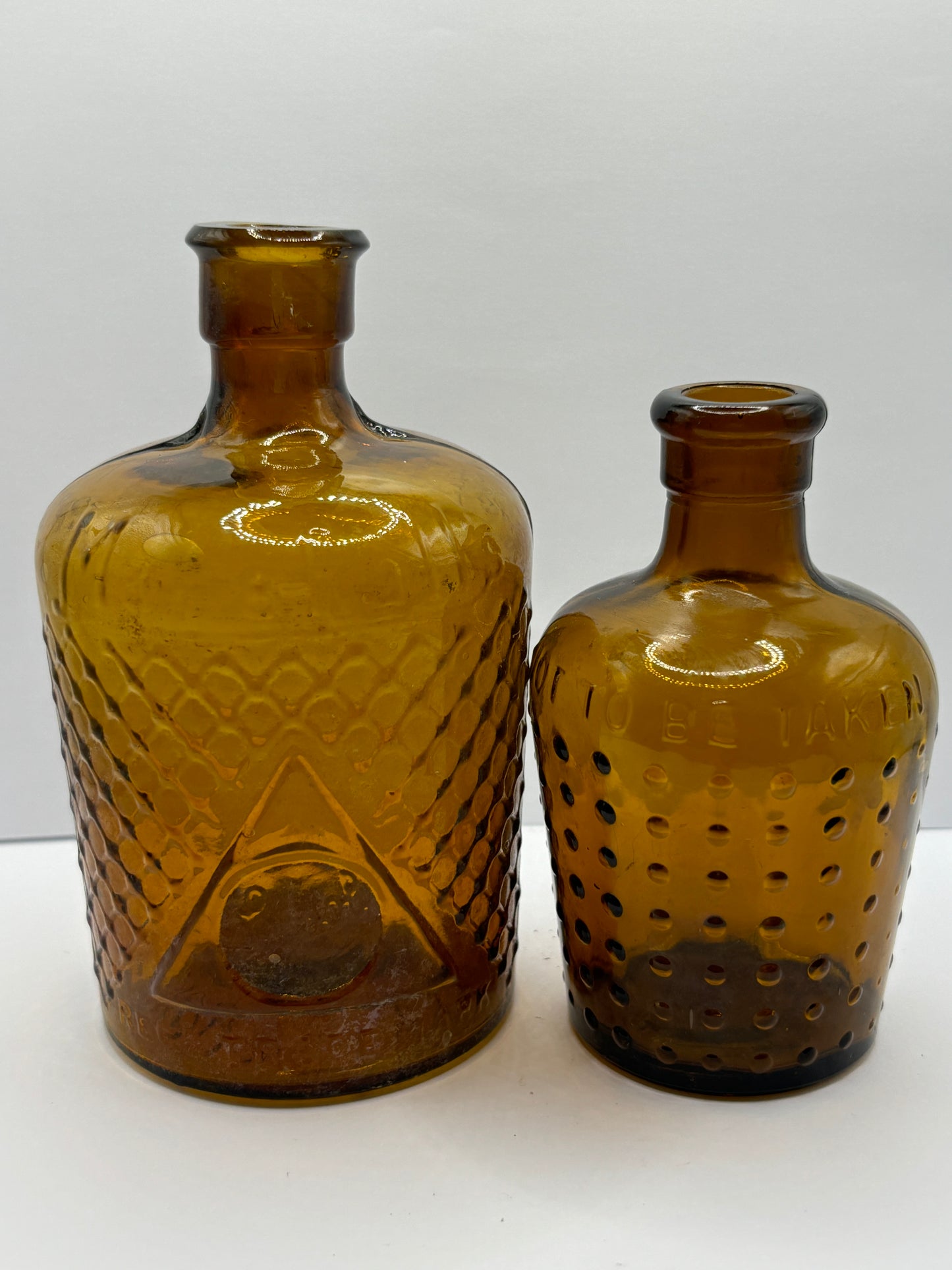 2 amber glass lysol bottles