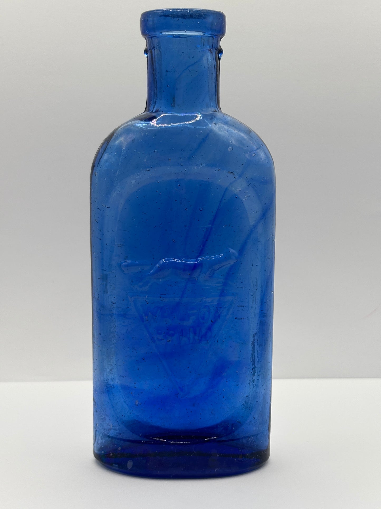 Old blue glass advertising chemist bottle, walfox brand