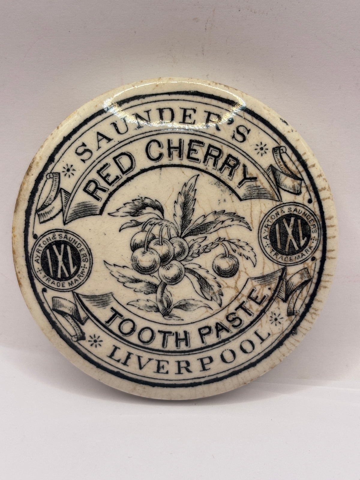 Old advertising lid, Saunders red cherry toothpaste 🍒