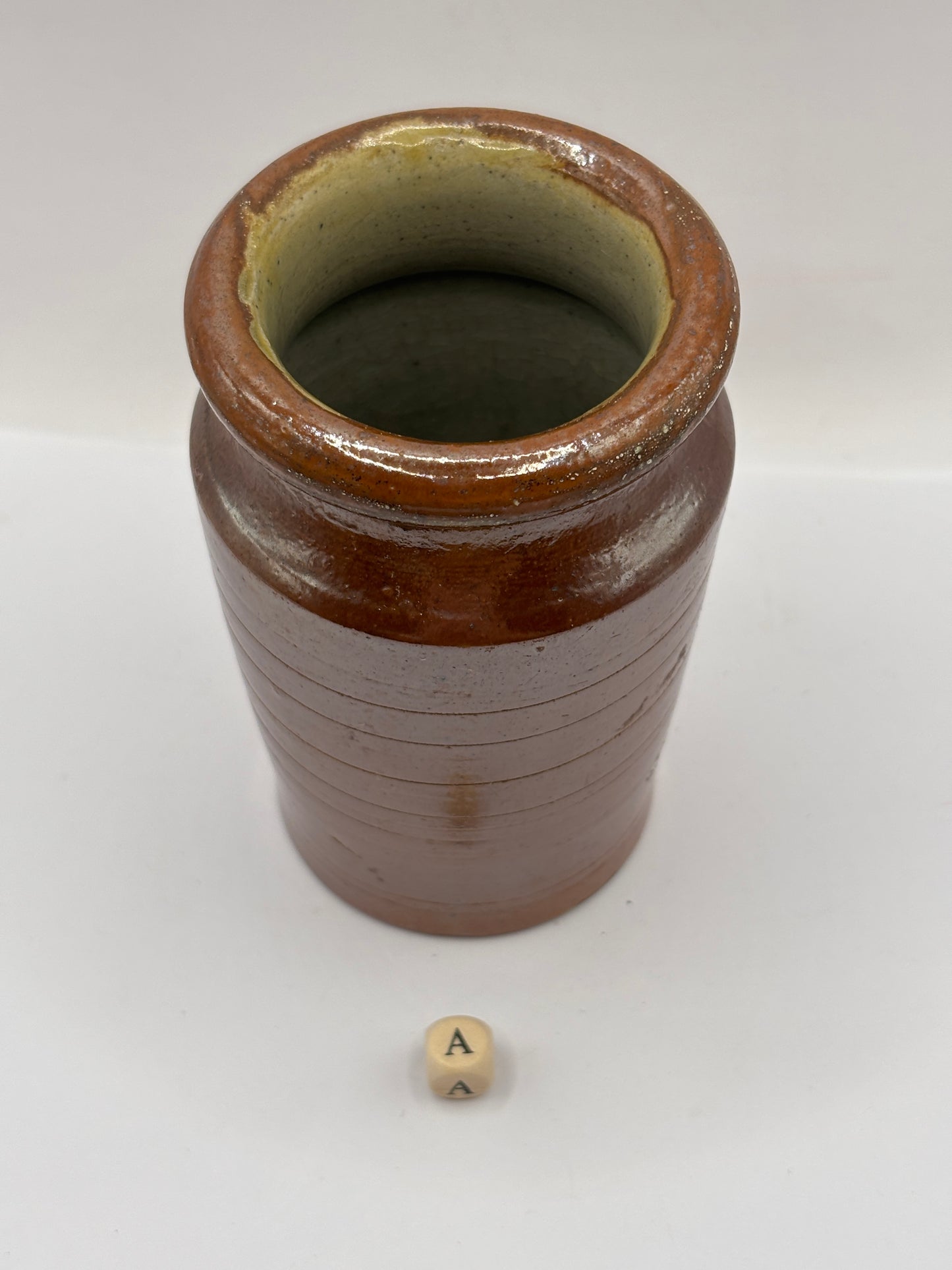 Old small brown stoneware jar (a) 11cms