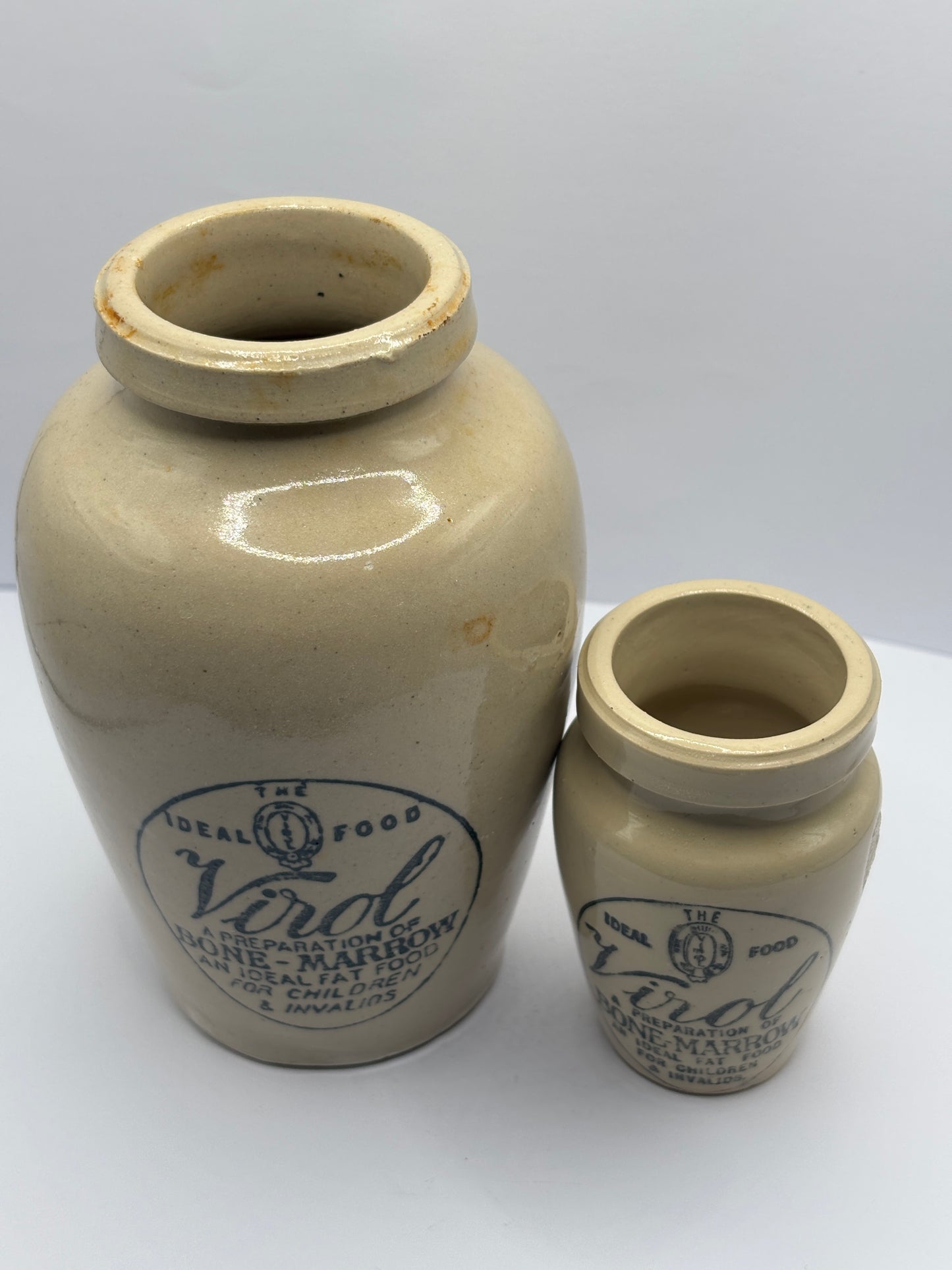 2 Old stoneware advertising Virol jars