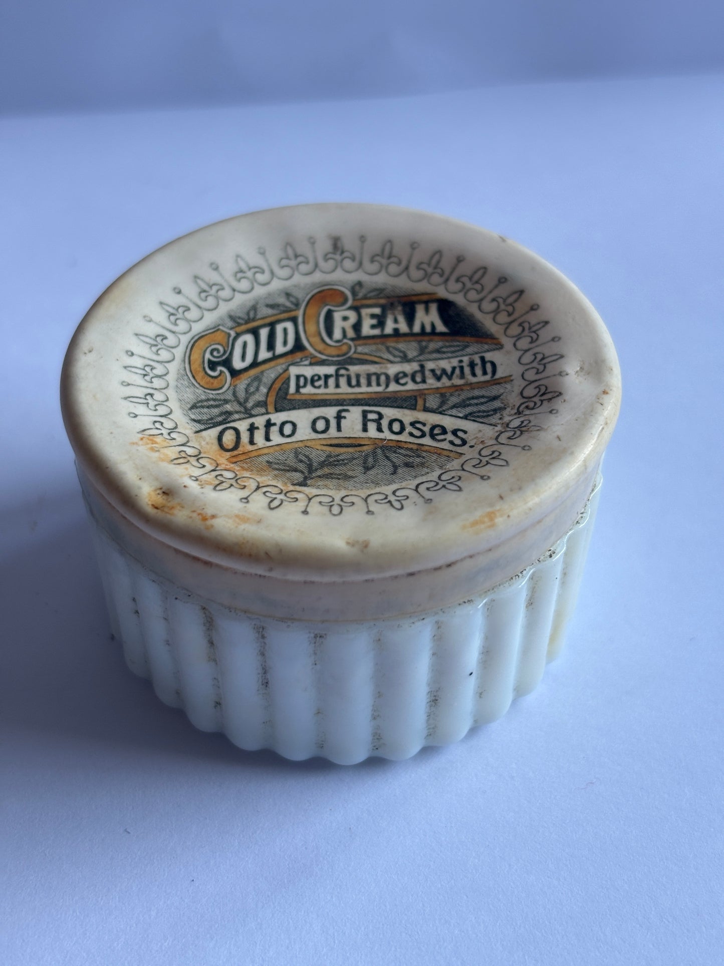 Old cold cream lid and base
