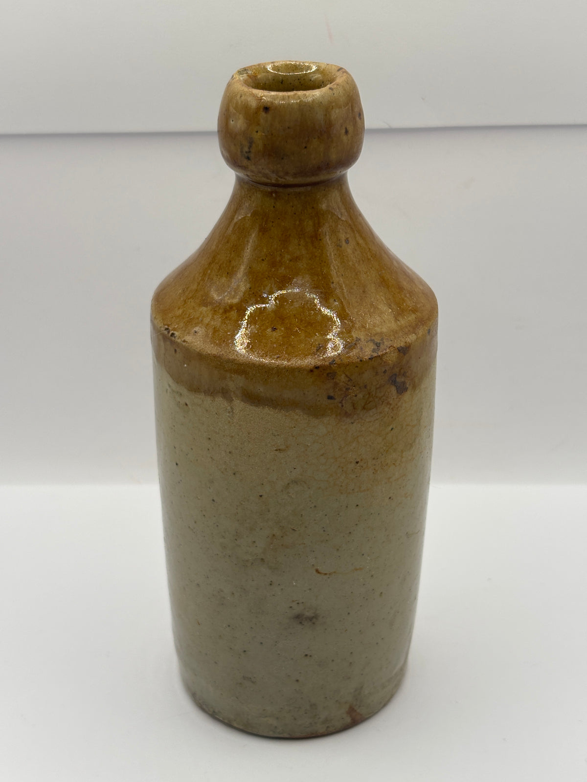 Old impressed stoneware ginger beer bottle, Manchester. J.Finch