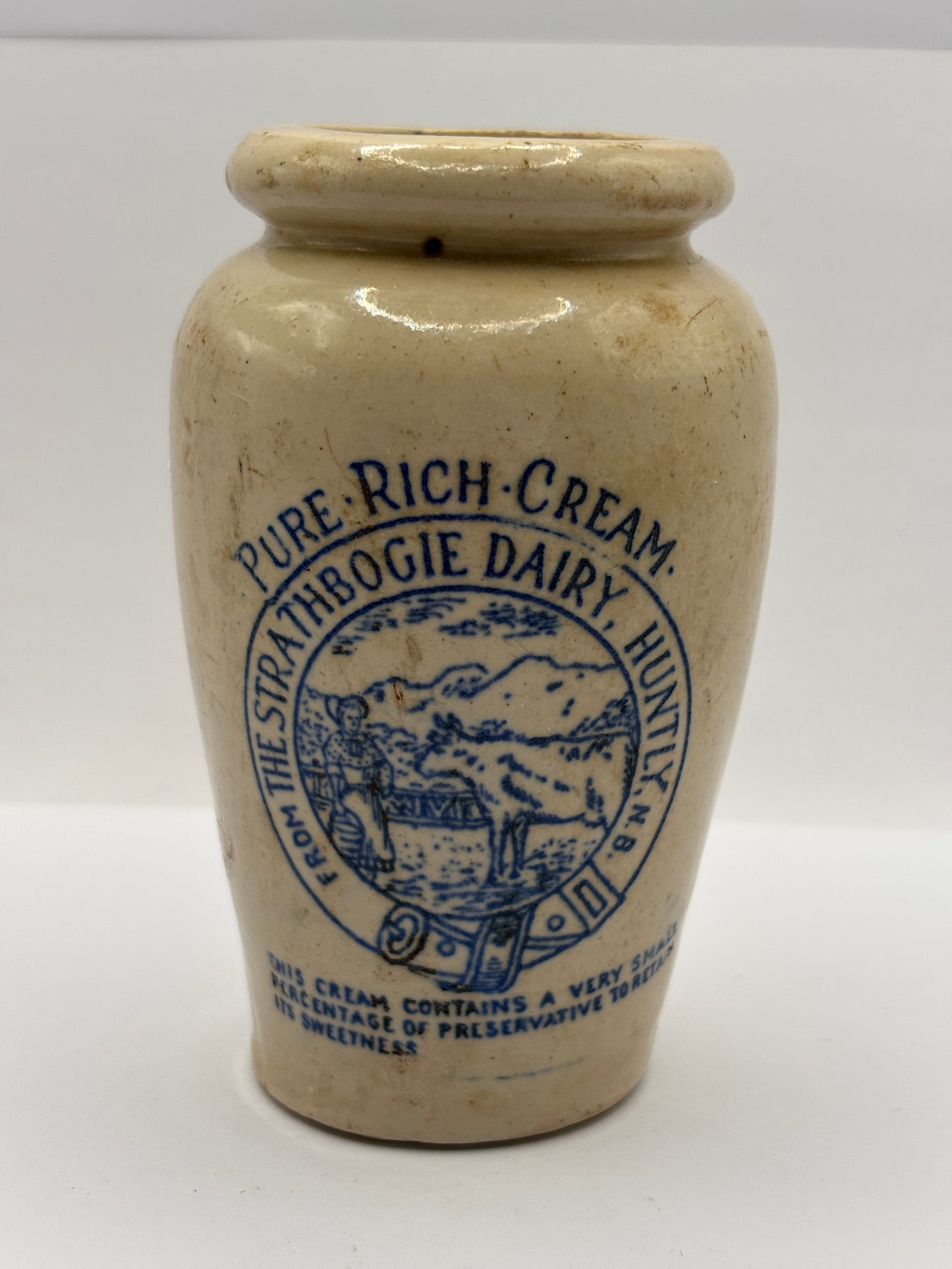 Old stoneware advertising cream pot, Strathbogie Dairy, pure rich cream. Blue print. Milk maid, cow