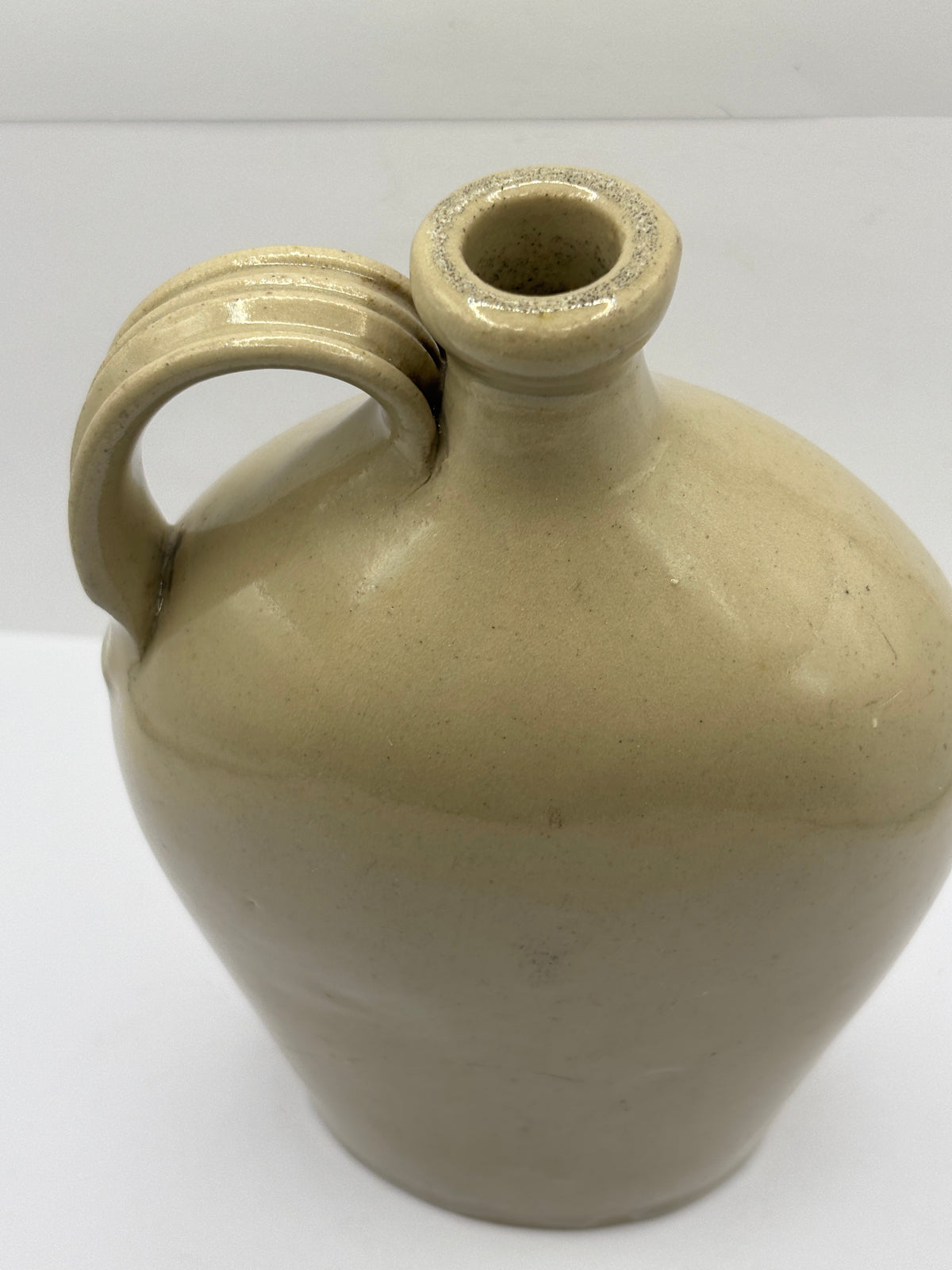 Old off white stoneware handled flask