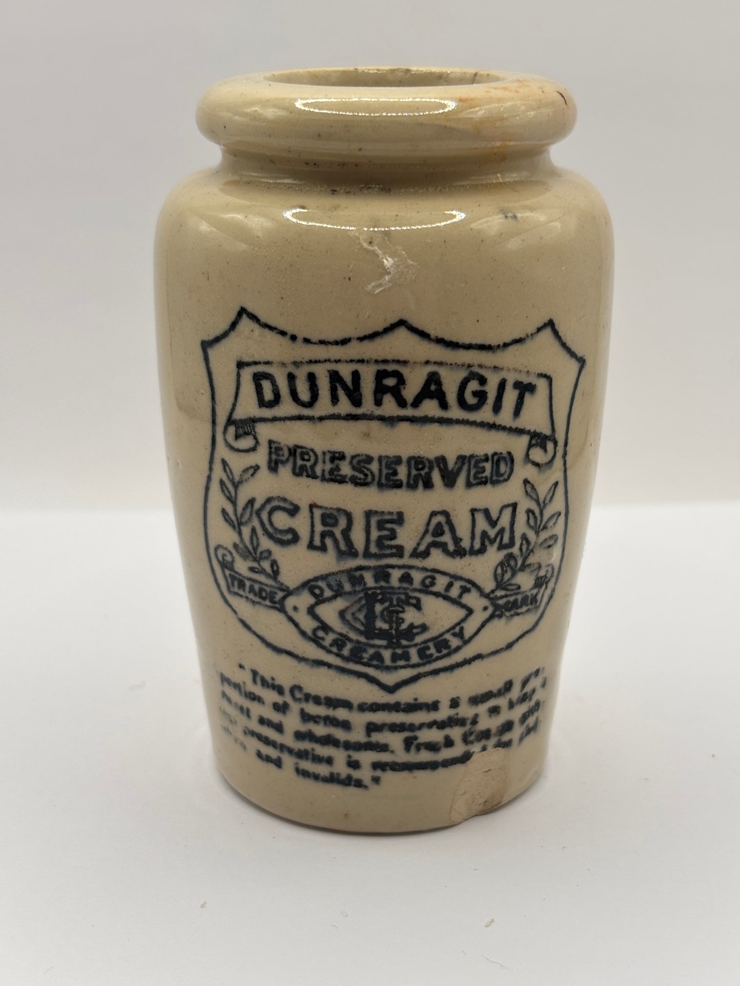 Old advertising cream pot, Dunragit preserved cream. Damaged