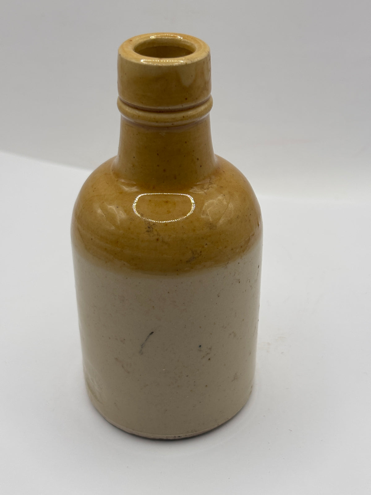 Old brown too stoneware bottle