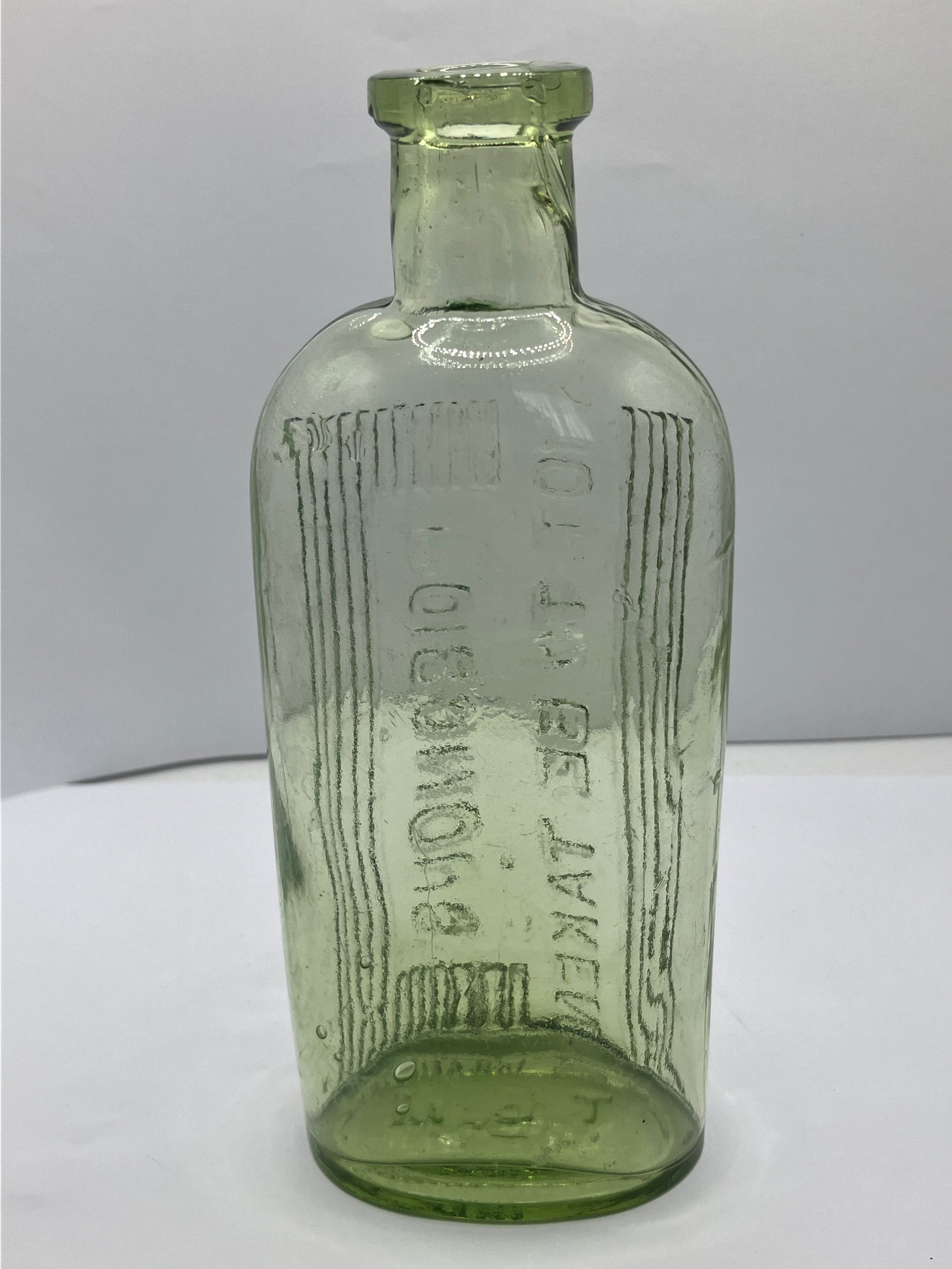 Green glass poison bottle, poisonous not to be taken