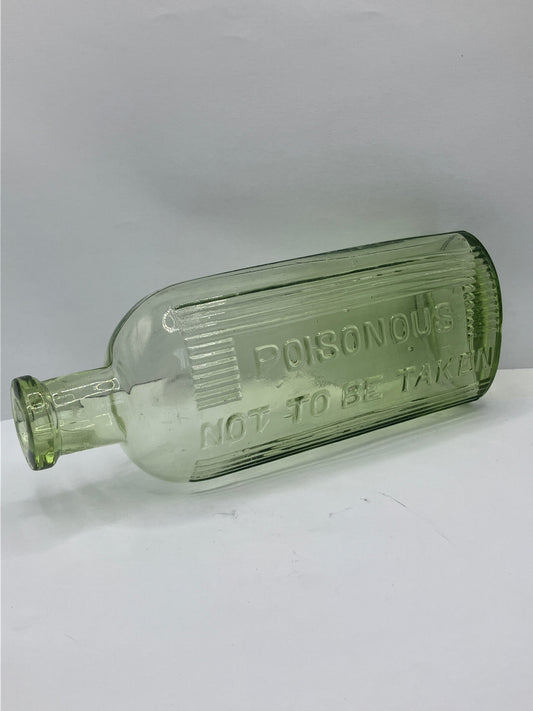 Green glass poison bottle, poisonous not to be taken