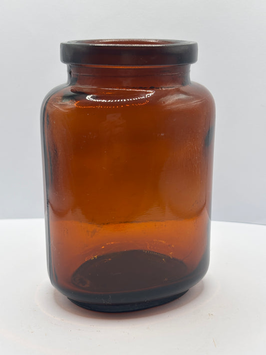 Old amber glass jar