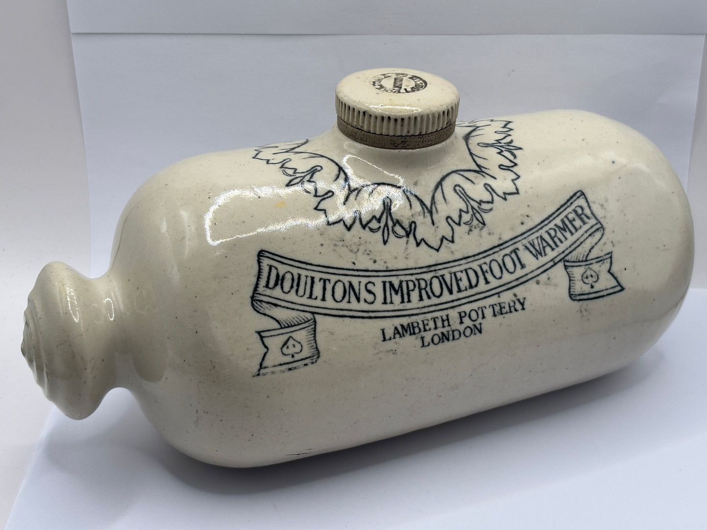 Old stoneware bed warmer/ foot warmer. Doultons improved foot warmer