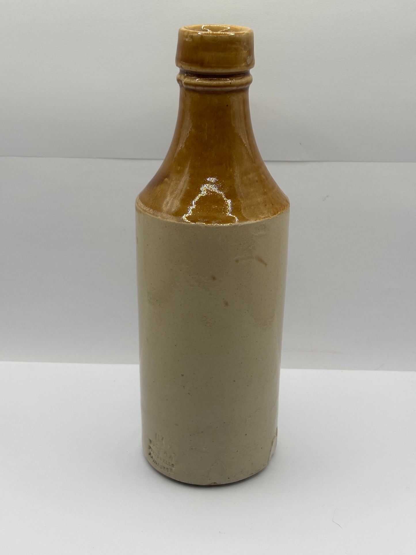 Old stoneware stout bottle, The Carlisle new brewery