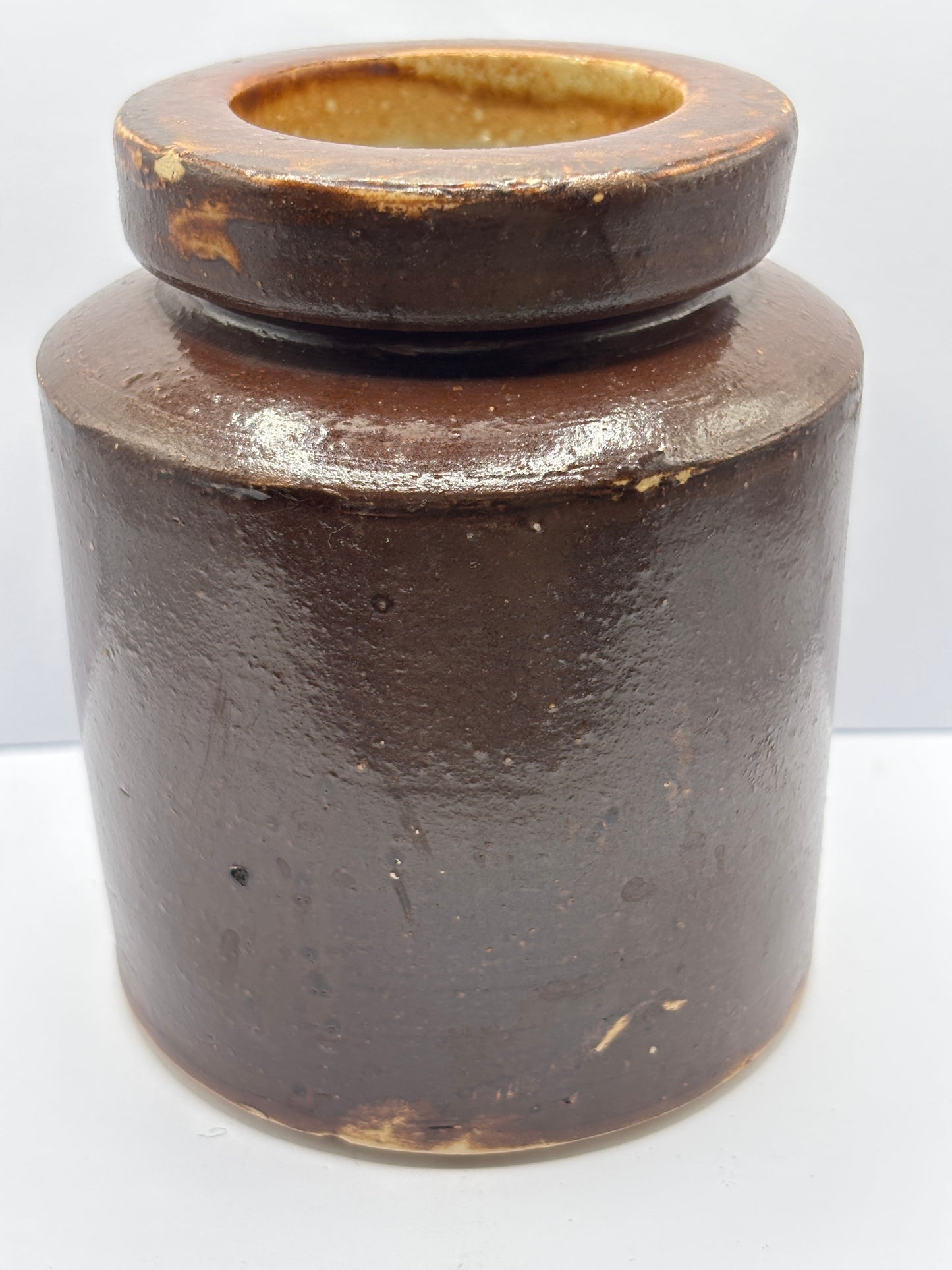 Old brown stoneware jar