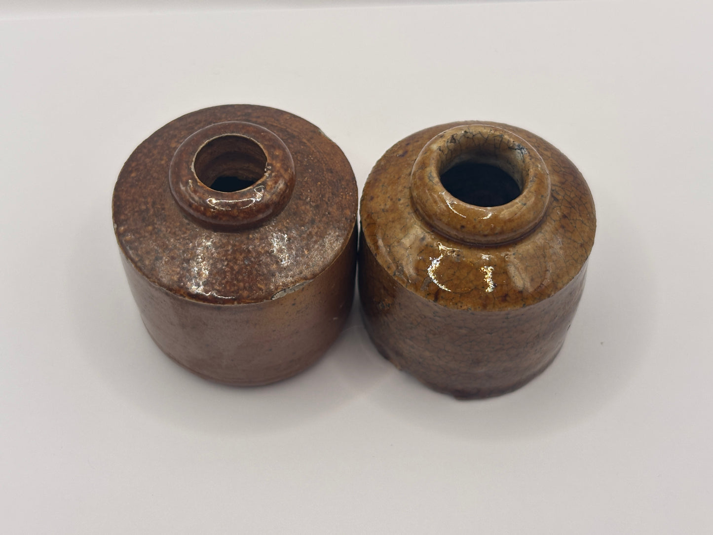 2 brown stoneware inkwells, ink bottles. Pork pie inks