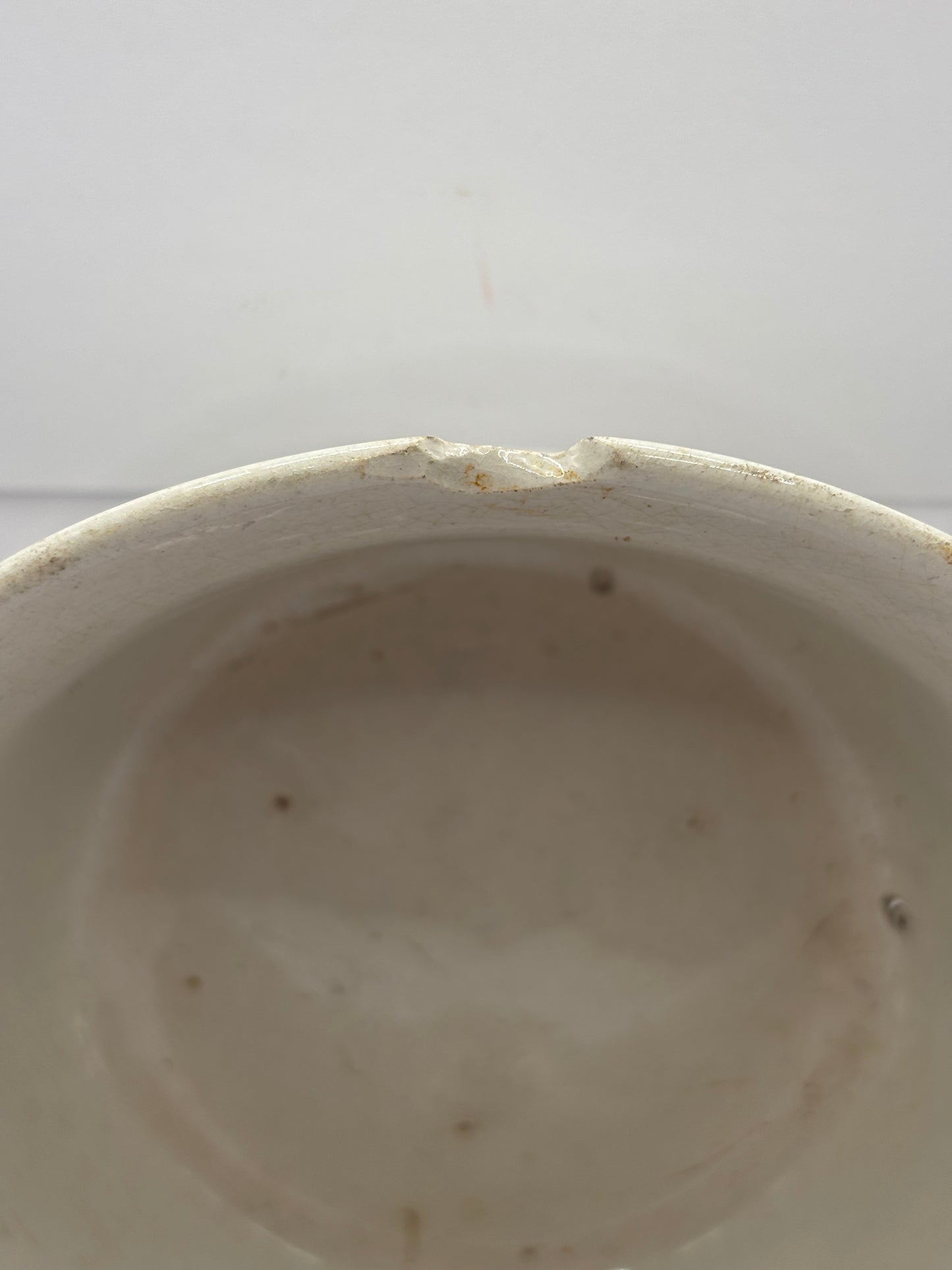 Old stained & crazed bowl