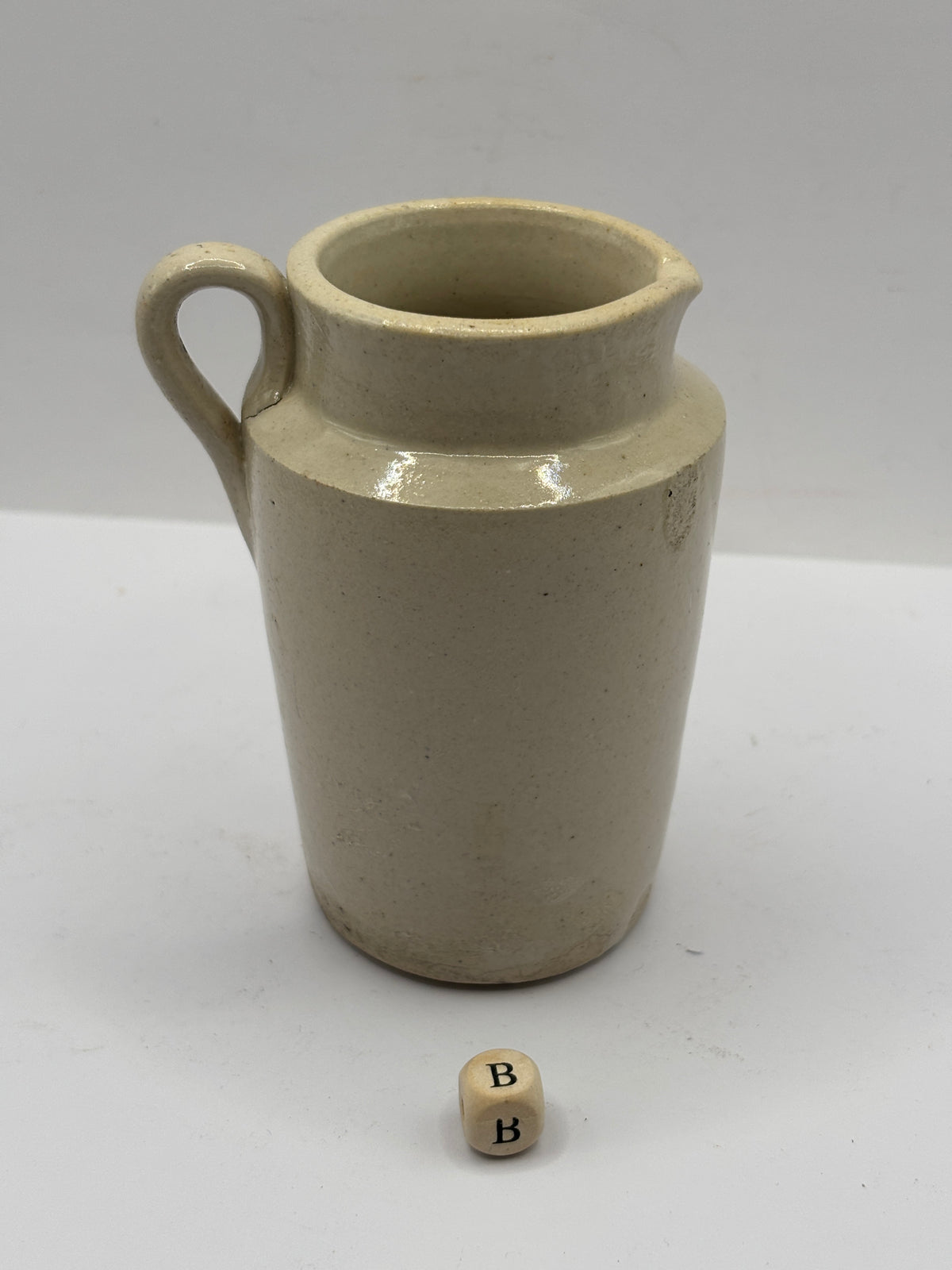 Old white stoneware cream jug (B)