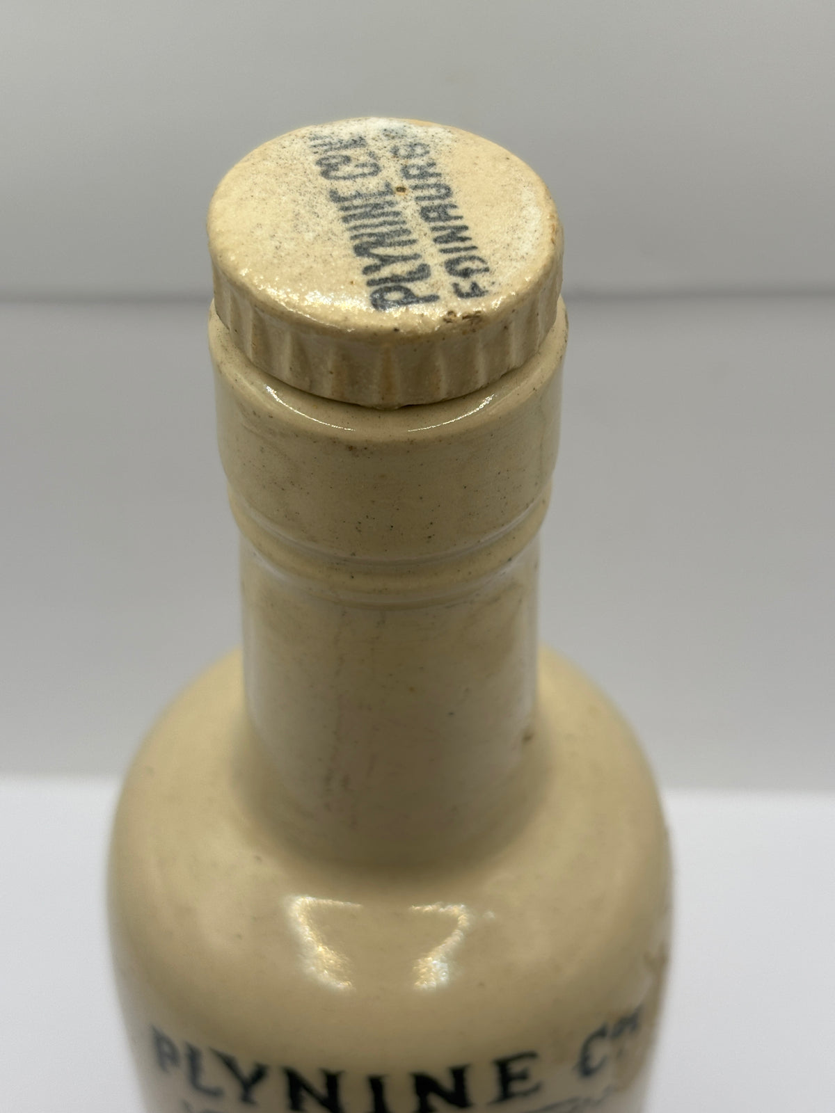 Old stoneware advertising bottle, Plynine household Ammonia with original stopper